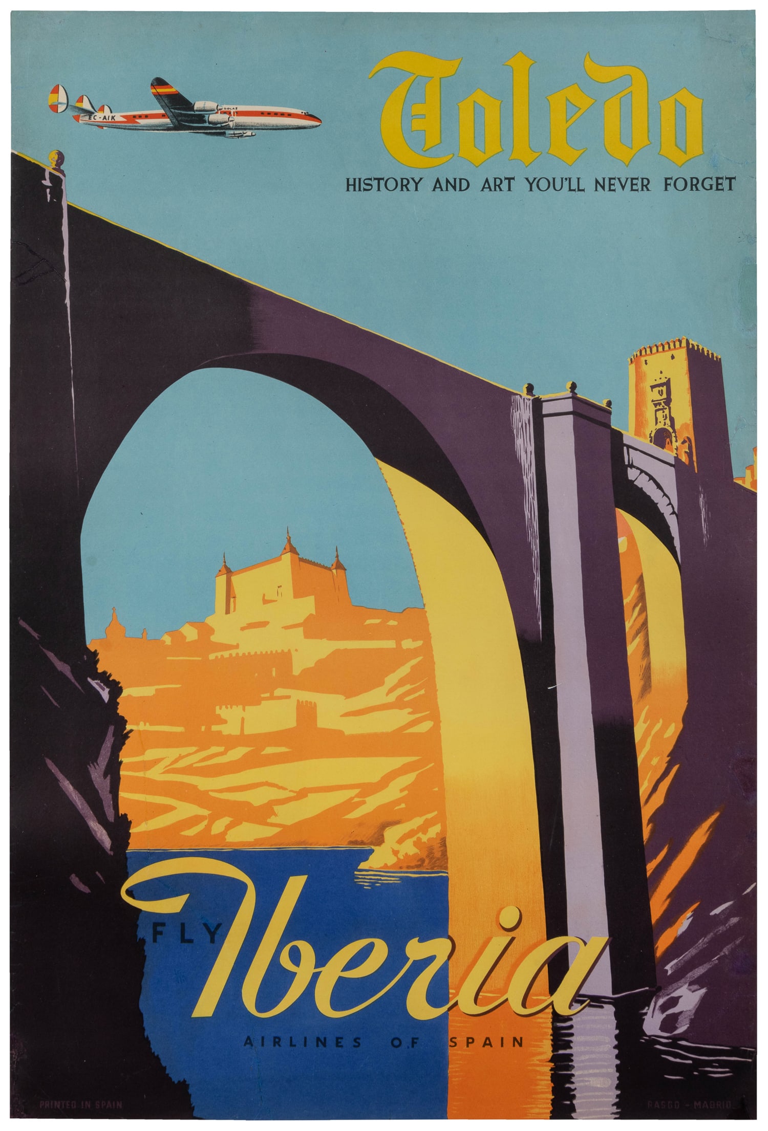 Toledo / Fly Iberia. Circa 1950s.: Toledo / Fly Iberia. Madrid: Rasgo, ca. 1950s. Offset lithograph travel poster with an anonymous illustration of Alcantara bridge in orange and purple hues. Linen backed. 36 1/4 x 24 1/2".