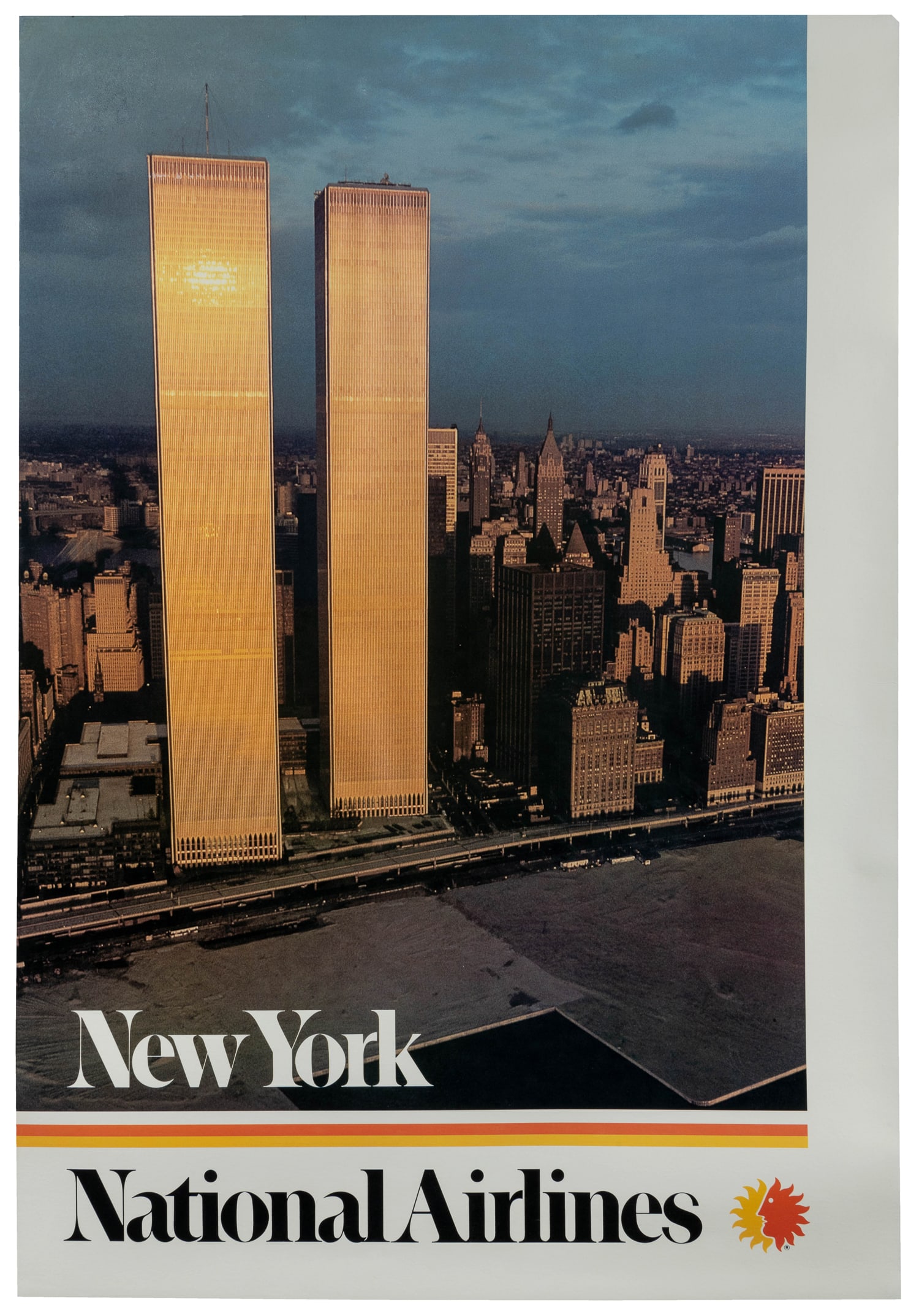 New York / National Airlines.: New York / National Airlines. Circa 1975. Color photo-offset airline poster with a view of the World Trade Center and city skyline at dusk. Linen backed. 41 x 28 1/4".