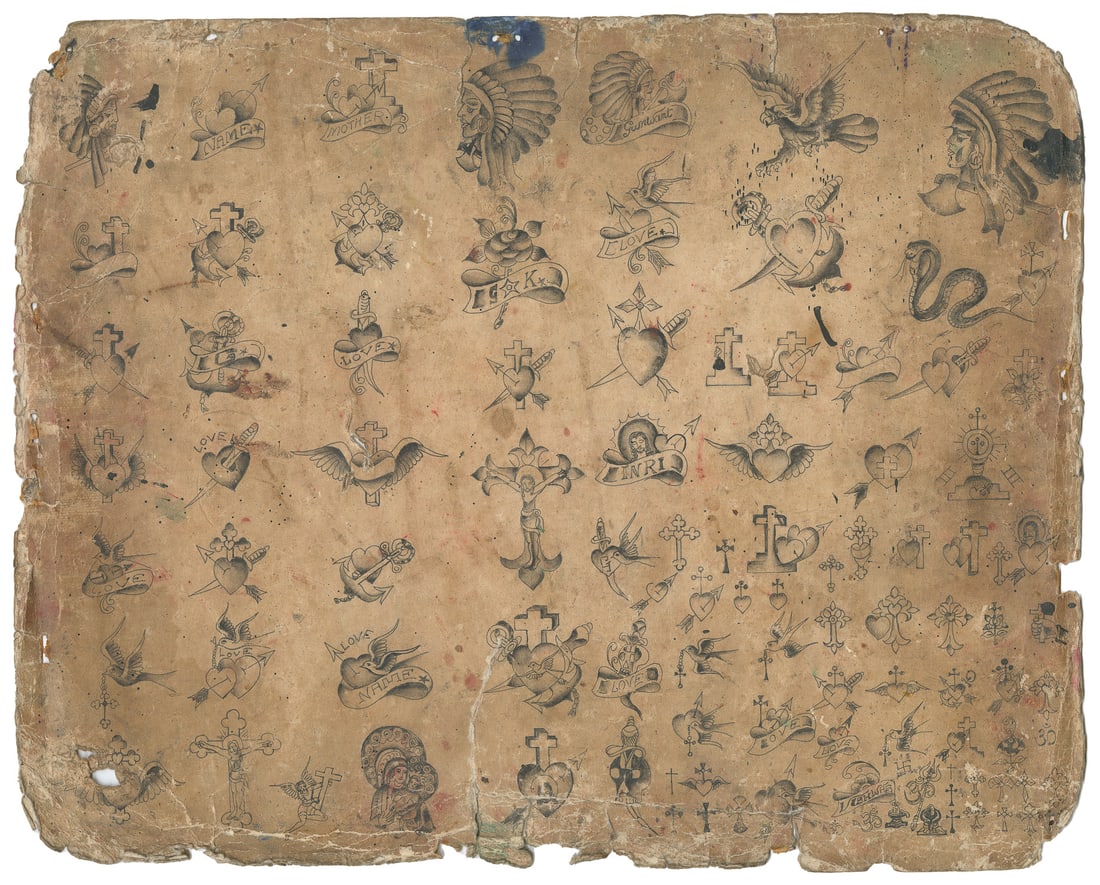Fifty Plus Designs, Mostly Related to Christian Iconography, ca. 1900s: Tattoo flash sheet by Unknown UK artist, ca. 1900s. Ink on paper, signs of adhesive on verso. Sheet features an array of small designs, including crucifixes, sacred hearts, Native Americans, and sparr