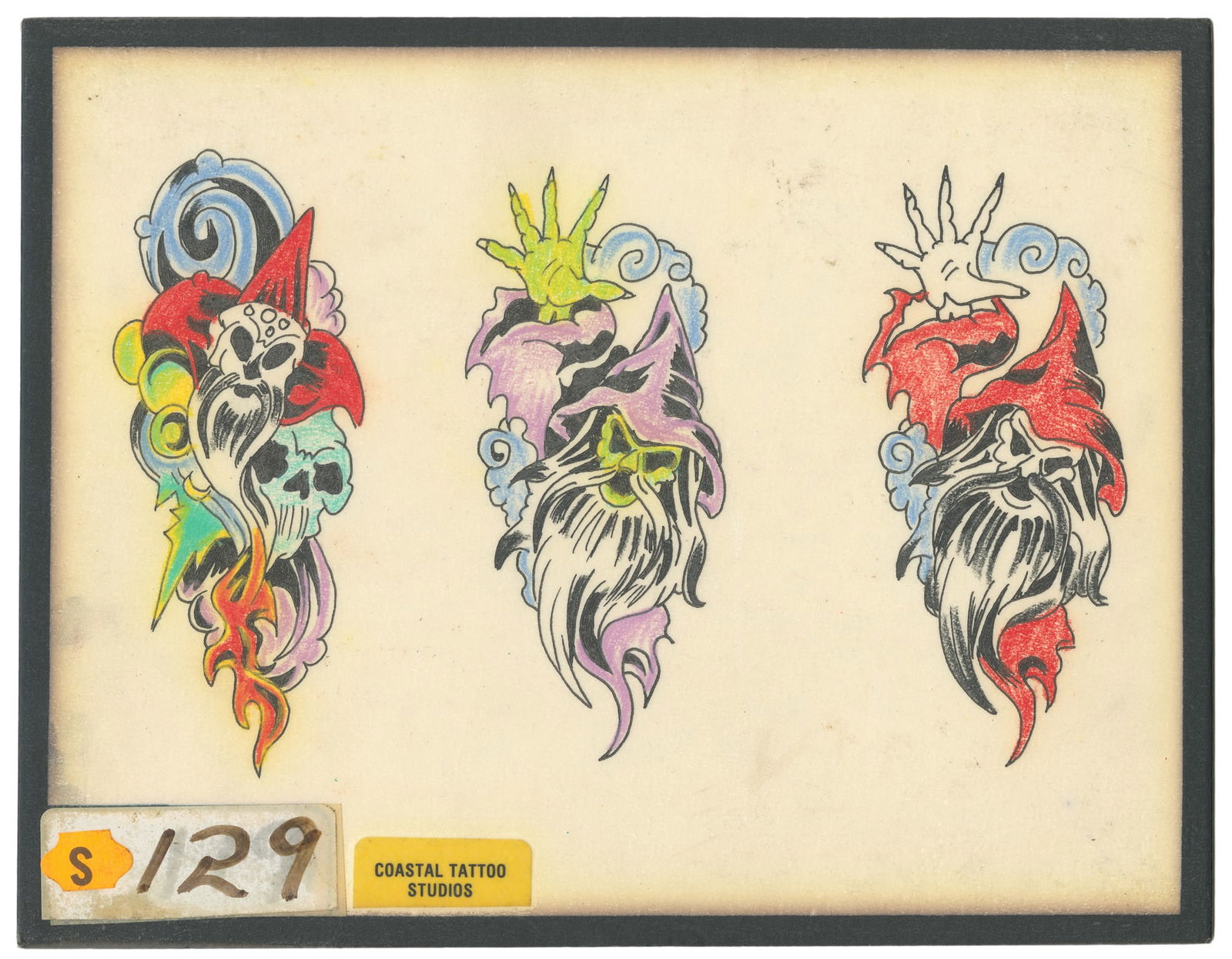 Sailor Barney Flash Sheet, Coastal Tattoo Studios: Sailor Barney Sr. (attributed). Coastal Tattoo Studios. Unsigned. Three design flash sheet with hand-colored (crayon or color pencil) wizard motifs. Shop sticker to the lower center margin. 10 x 8". T