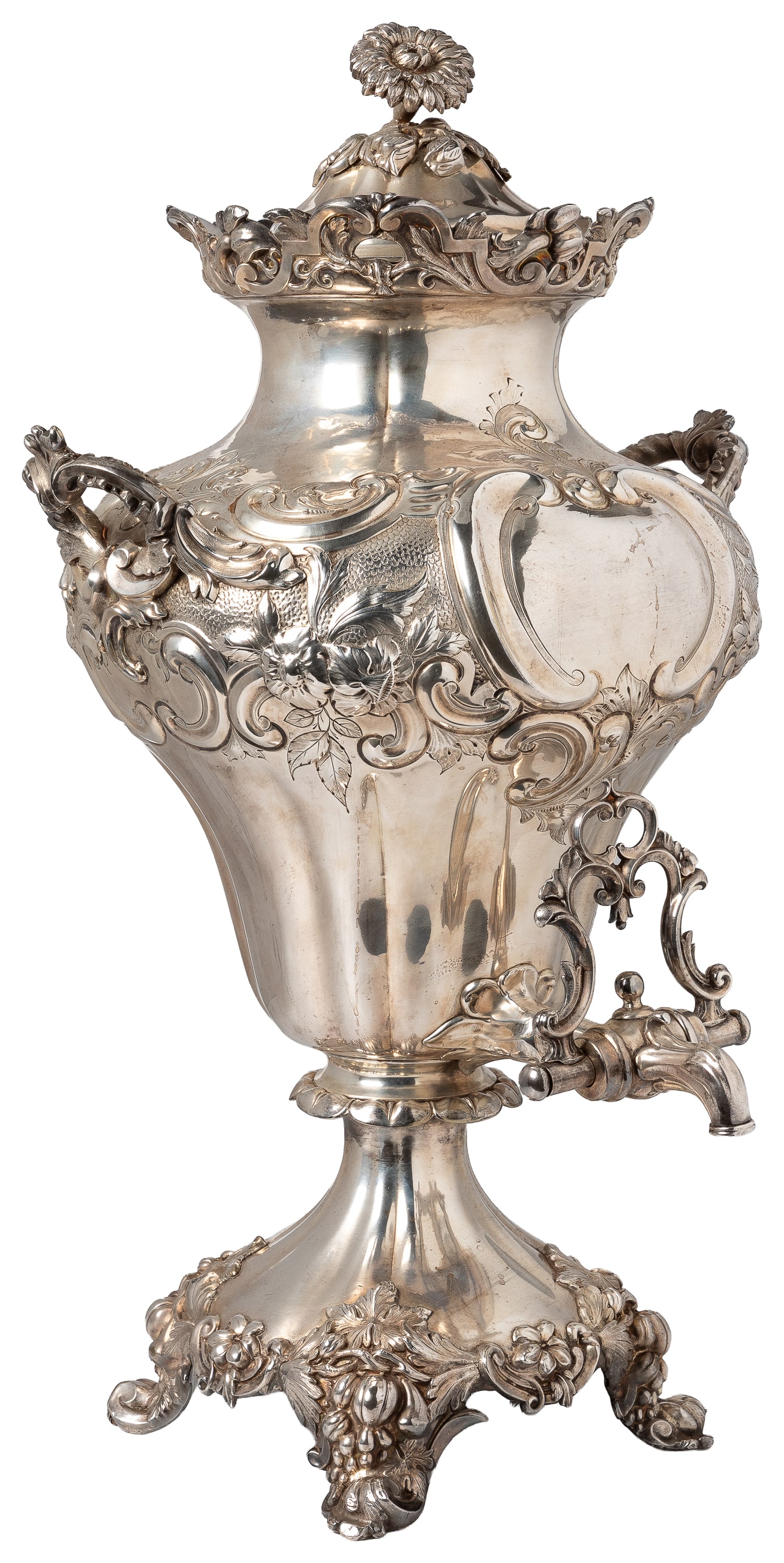 Victorian silverplate large samovar.: Victorian silverplate large samovar. 19th century. Ornately case with floral and scrollwork design, with lid and spout with handle, two bell marks to underside. With a zippered dust-bag. 21 1/2 x 12 1
