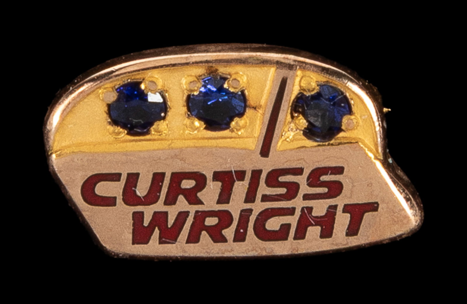 Curtiss Wright 10k gold lapel pin.: Curtiss Wright 10k gold lapel pin. Enameled lettering, three inset semi-precious tones across the front. Width approx. 1/2".
