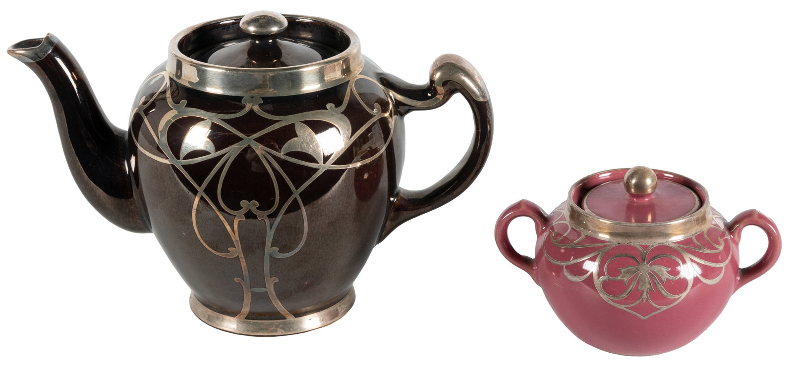 Ceramic Art Nouveau Teapot and Sugar Bowl with Silver Overlay. Circa 20th century. (1 of 1)