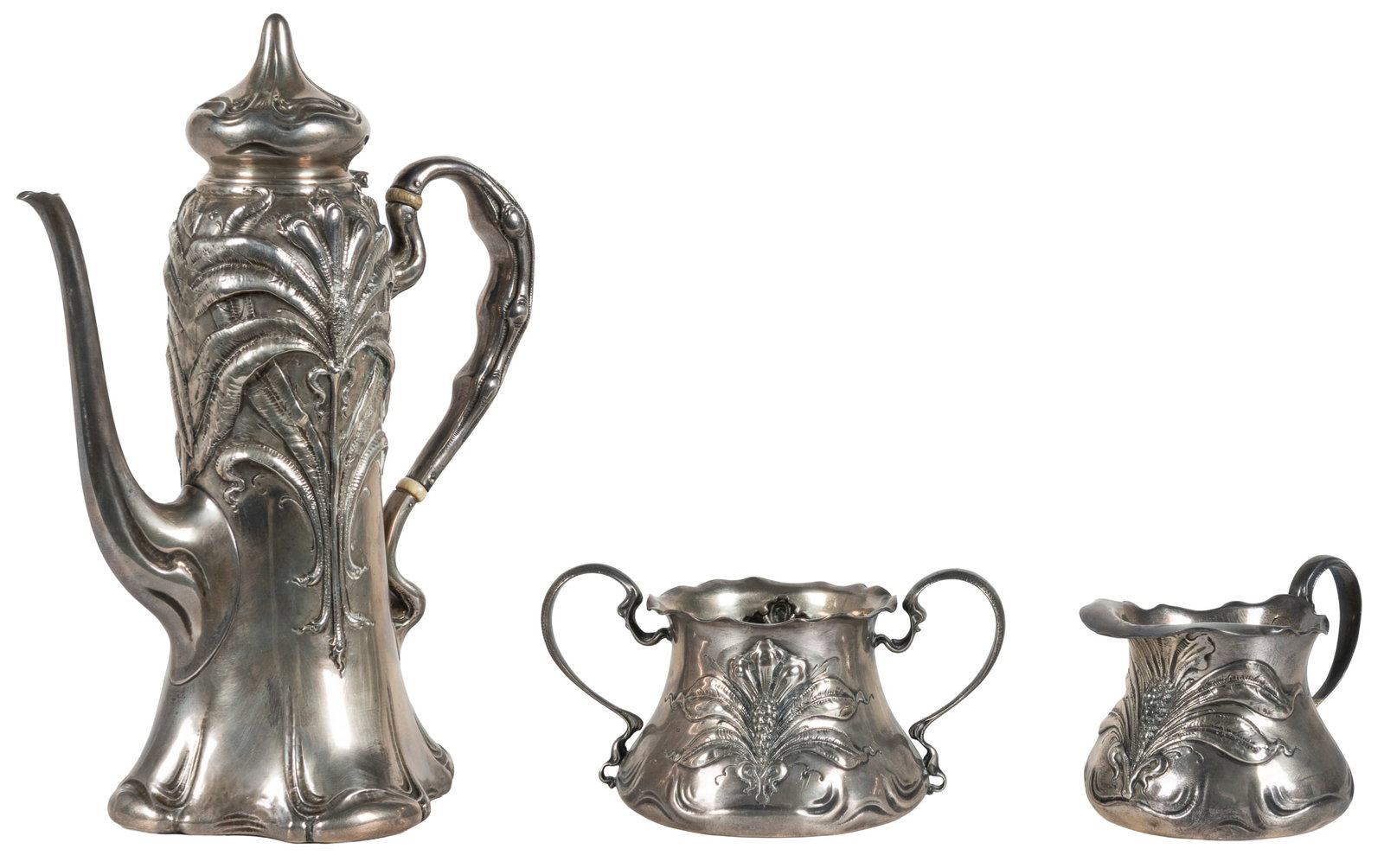 C.D. Peacock sterling silver coffee set.: C.D. Peacock sterling silver coffee set. Circa late 19th century. Art Nouveau coffee set including pitcher, creamer, and waste bowl. Each hallmarked to underside. Largest 8 1/2 x 6 x 4". Total