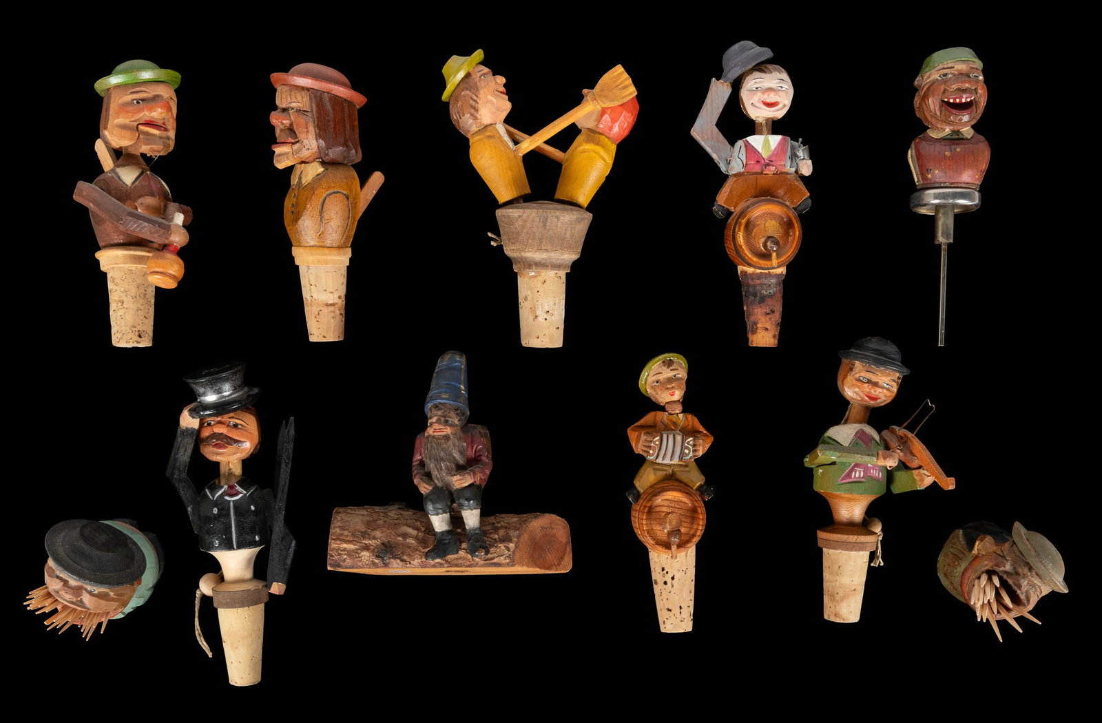 Eleven Anri carved wooden bottle stoppers and toothpick holders. (1 of 1)