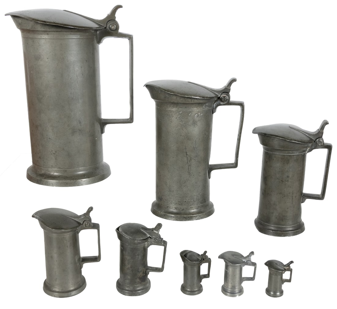 Set of 8 French pewter covered measures.: Set of 8 French pewter covered measures. Circa early to mid 19th century. Handsome set of eight measures with covers and handles, from Centilitre to Double Litre. Impressed with the measurement at