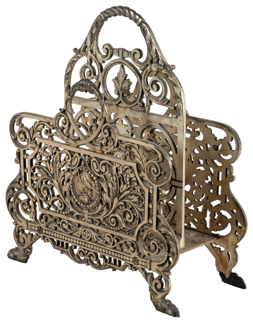 Bradley & Hubbard cast iron letter holder.: Bradley & Hubbard cast iron letter holder. 20th century. Heavily and ornately cast double-compartment letter holder, weighing over 5 pounds, with central medallion portraits on the sides. Embossed