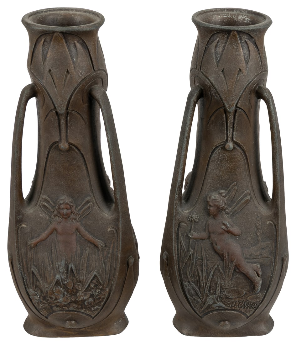 GARNIER, Jean (1853 - 1910). Pair of Art Nouveau fairy vases.: GARNIER, Jean (1853 - 1910). Pair of Art Nouveau fairy vases. Circa 1900s. Cast spelter vases with panels depicting fairies / nymphs, signed "J Garnier." Each 12 x 4 1/2 x 4 1/2".