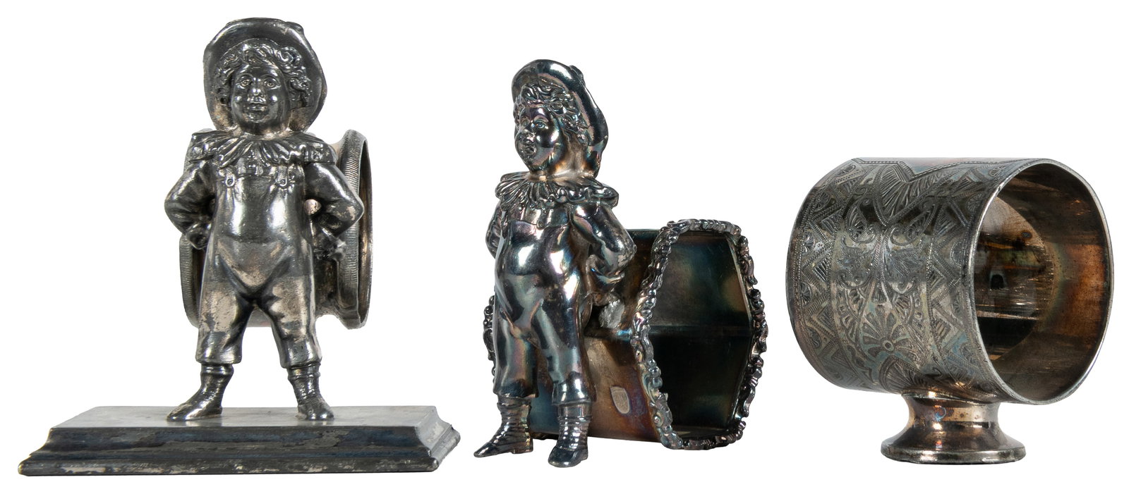 Three antique silverplate napkin rings. (1 of 2)