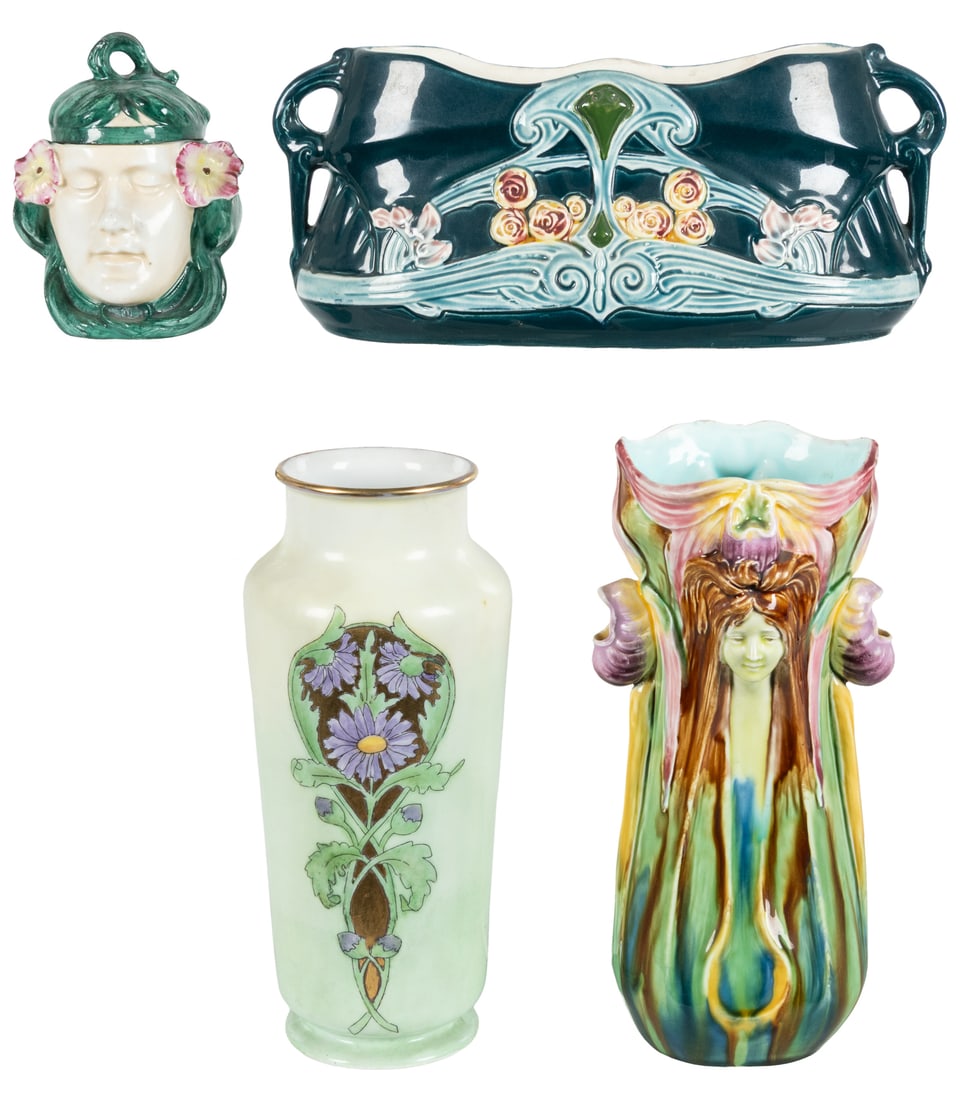 Art Nouveau ceramic pottery (4).: Art Nouveau ceramic pottery (4). Circa 1900s. Three vases and one covered figural container. One marked Austria, others impressed or stamped with numerals only. The largest 10 1/2 x 4 x 4".