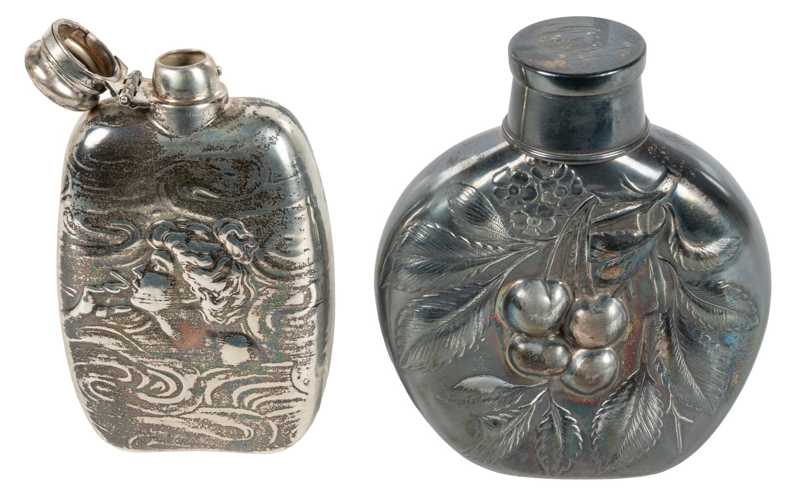 Art Nouveau sterling silver hip flask, and another (2).: Art Nouveau sterling silver hip flask, and another (2). Unger Bros, ca. 1900. Flask with repousse relief of a beautiful woman smoking a cigarette. Marked "Sterling 925 Fine" (rubbed). 5 1/2 x 3 x 1