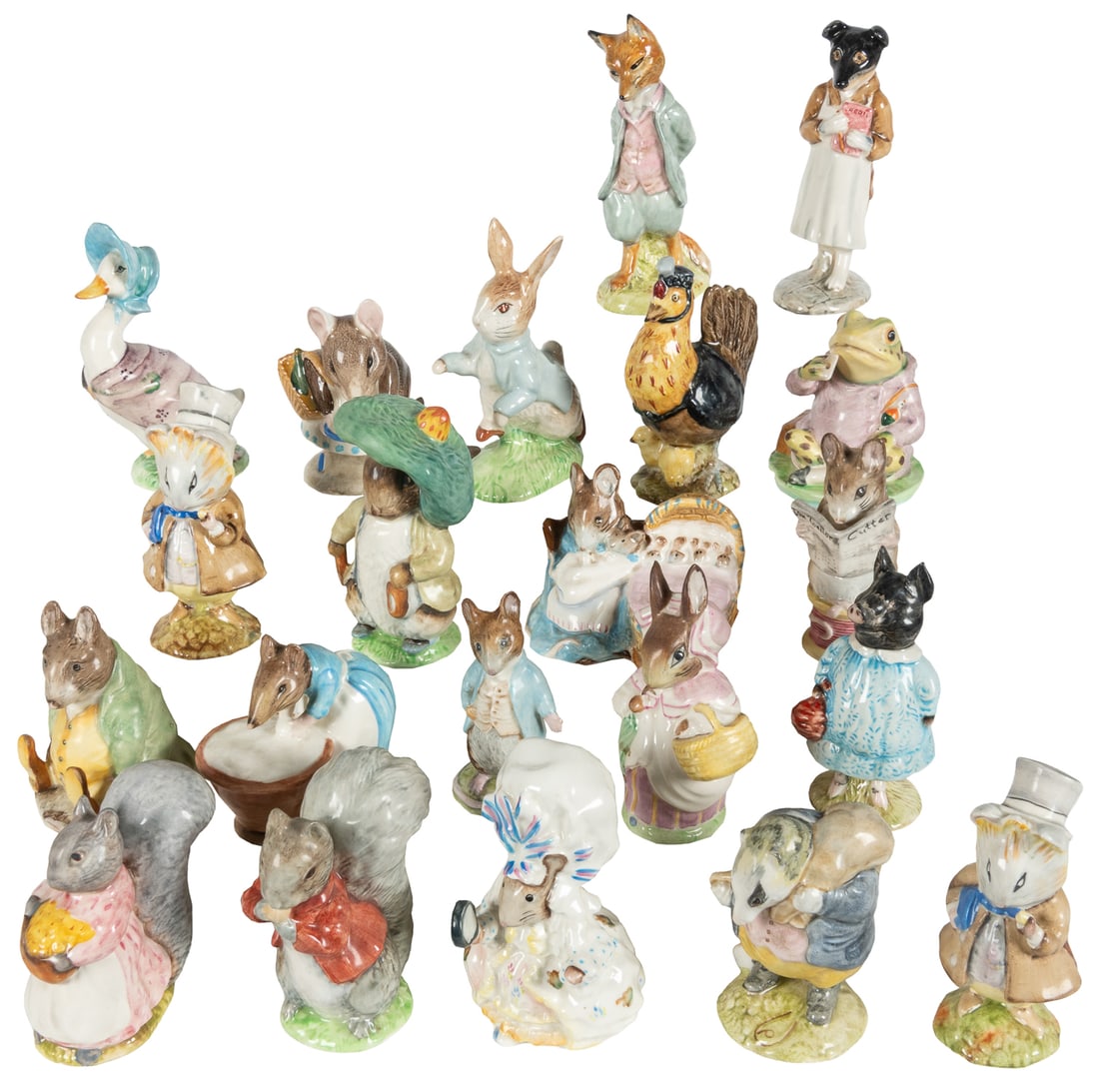 Group of 21 Beswick, England, Beatrix Potter Porcelain Figurines. Issued 1940s-70s.: Group of 21 Beswick, England, Beatrix Potter Porcelain Figurines. Issued 1940s-70s. Hand-painted. Each stamped on the underside: BEATRIX POTTER'S "[character's name]" / F. Warne & Co. Ltd. /