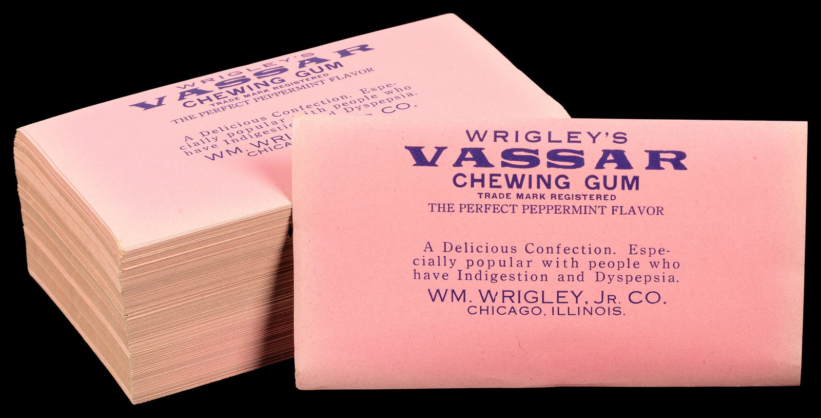 Wrigley's Vassar Chewing Gum wrapper lot.: Wrigley's Vassar Chewing Gum wrapper lot. Chicago et al, ca. 1920s. A one and a half inch stack of unused original wrappers for this Wrigley gum brand, printed in purple on pink paper. Uncounted,