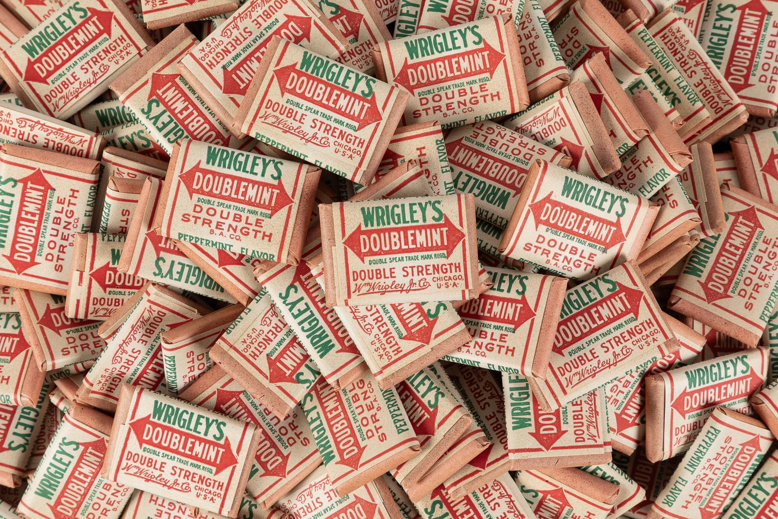 Wrigley's Doublemint tab chewing gum lot.: Wrigley's Doublemint tab chewing gum lot. Chicago, ca. 1920. A Ziploc bag filled with unused Doublemint gum in original wrappers. Uncounted, approximately 75-100 pieces. Each 1 1/4 x 1".