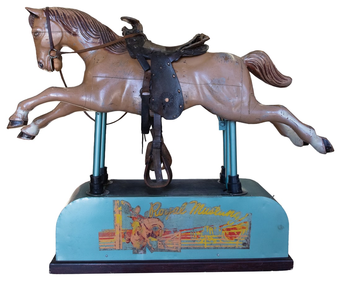 Royal Mustang wooden horse kiddie ride.: Royal Mustang wooden horse kiddie ride. Los Angeles: Royal Engineering Co., ca. 1950s. Wooden horse with leather saddle, on blue sheet metal base with color decals, including 10 cent decal on front,