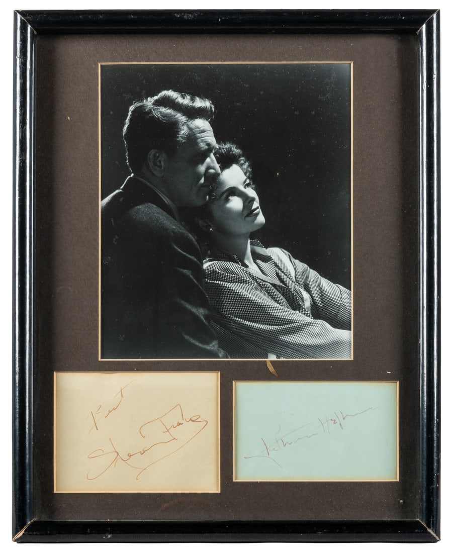 [HEPBURN, Katharine (1907–2003) and TRACY, Spencer (1900–1967)]. Still Photograph from: [HEPBURN, Katharine (1907–2003) and TRACY, Spencer (1900–1967)]. Still Photograph from "Woman of the Year" along with Separate Autographs. Photograph sight: 8 1/4 x 6 3/4". Frame: 14 3/4