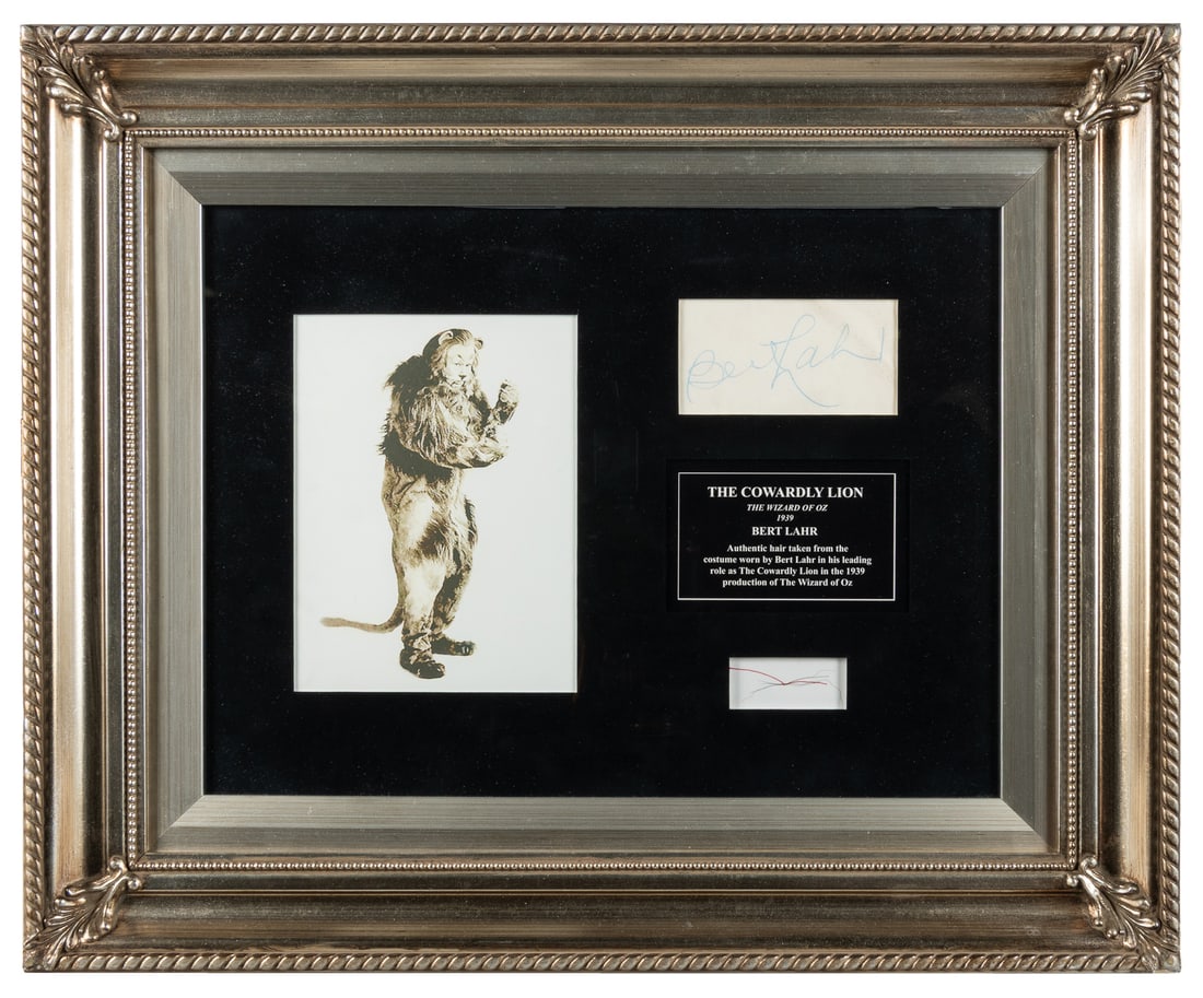 [WIZARD OF OZ]. Strand of hair from Cowardly Lion's costume, and Bert Lahr signature.: [The Wizard of Oz]. Strand of hair from Cowardly Lion's costume, and Bert Lahr signature. Framed display includes a hair sample from The Cowardly Lion costume, and a Bert Lahr autograph in blue ink