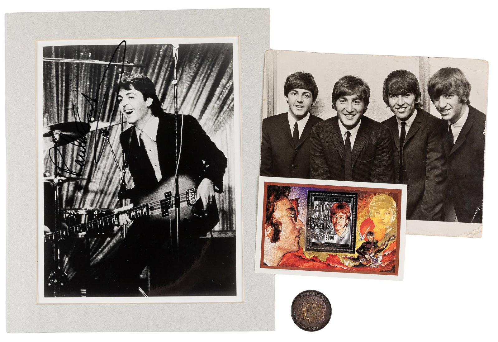 [THE BEATLES]. Group lot including a secretarially signed photo. (1 of 2)