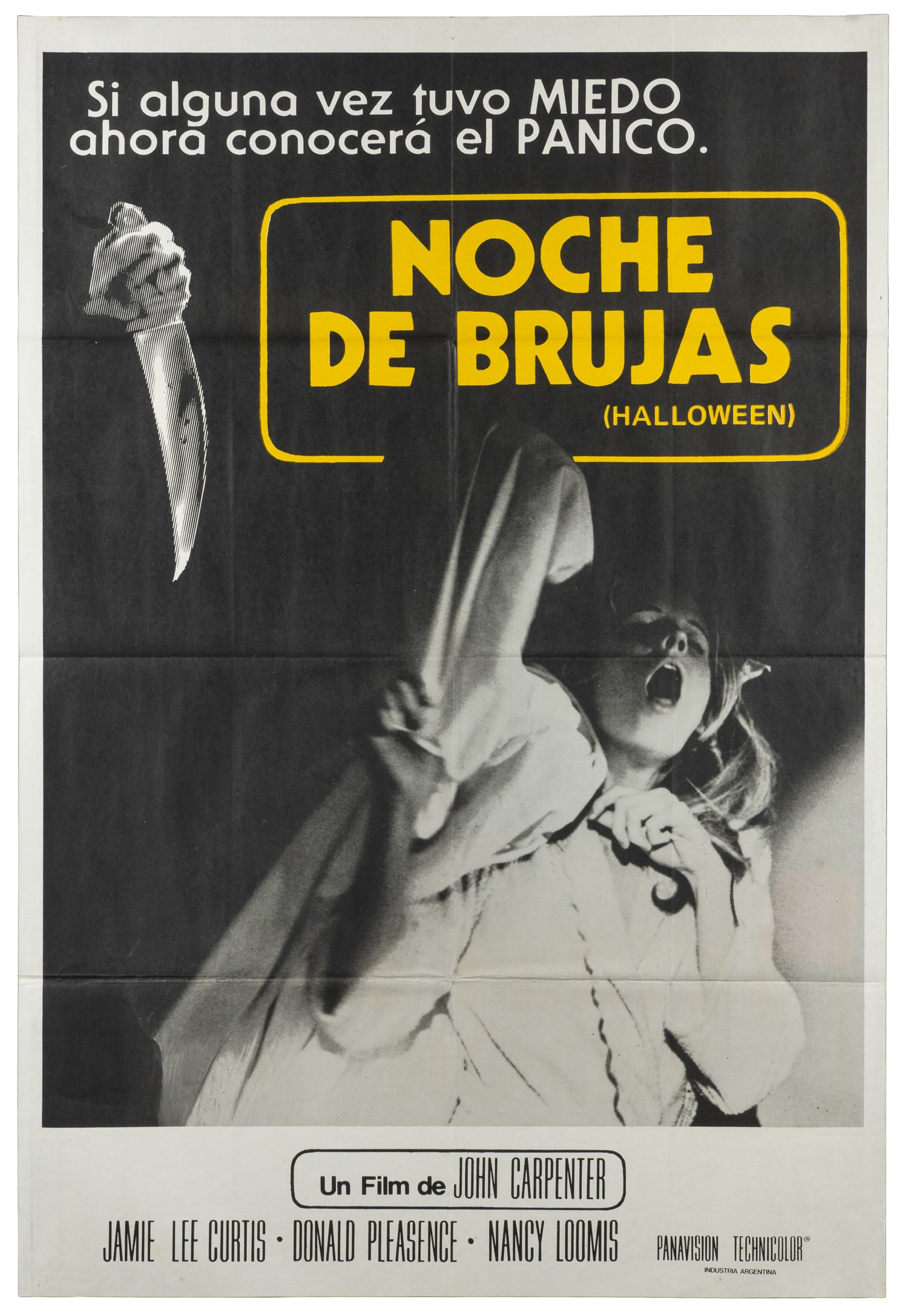 Halloween. Compass International, 1978.: Halloween. Compass International, 1978. Noche de Brujas. One sheet Argentinian poster for the influential slasher film starring Jamie Lee Curtis and directed by John Carpenter.29 x 42 1/2".