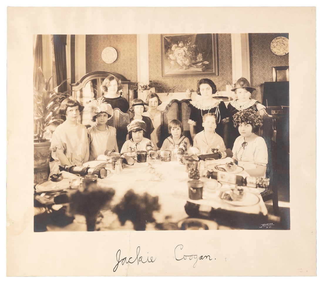 [COOGAN, Jackie (1914-1984)]. Jackie Coogan Signed Family Photograph. New York: Apeda, ca. 1920s. (1 of 1)