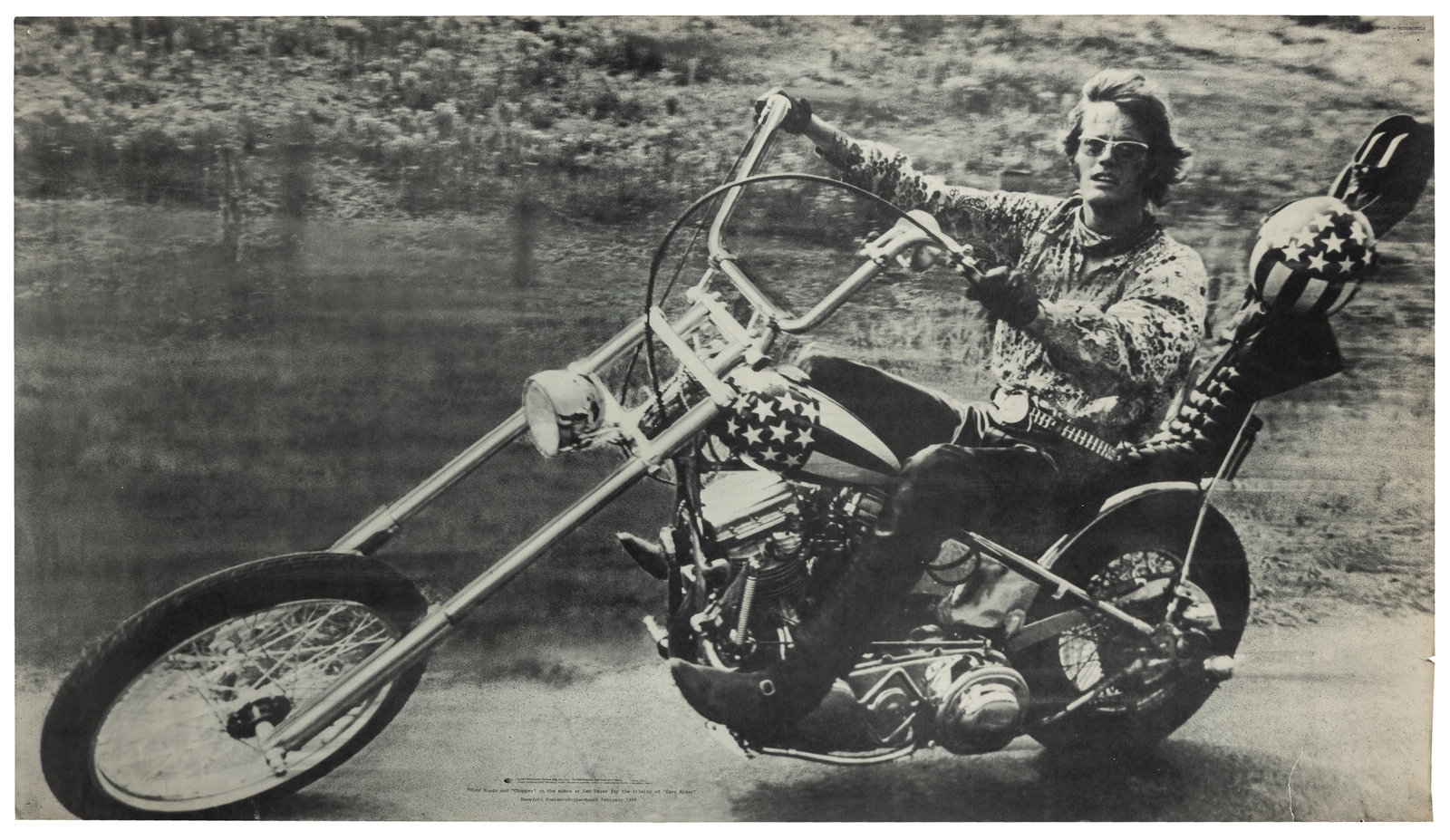 Peter Fonda and Chopper on the Scene at Las Vegas for the Filming of Easy Rider. 1969.: Peter Fonda and Chopper on the Scene at Las Vegas for the Filming of Easy Rider. 1969. New York: Personality Posters. Full-bleed black-and-white poster depicting Peter Fonda on the set of Easy