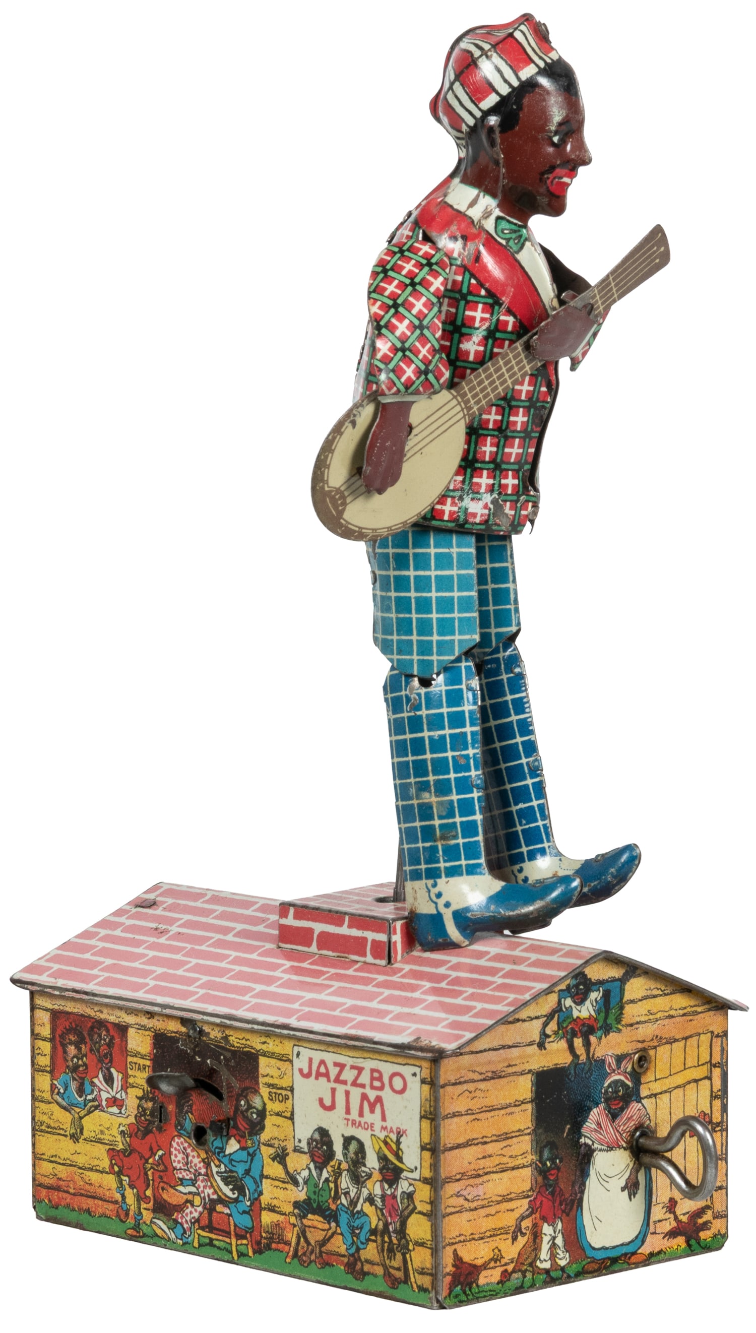 Unique Art Jazzbo Jim wind-up tin toy.: Unique Art Jazzbo Jim wind-up tin toy. Newark, 1921. Tin litho wind-up toy depicting a dancing banjo player.9 1/2 x 5 x 3".