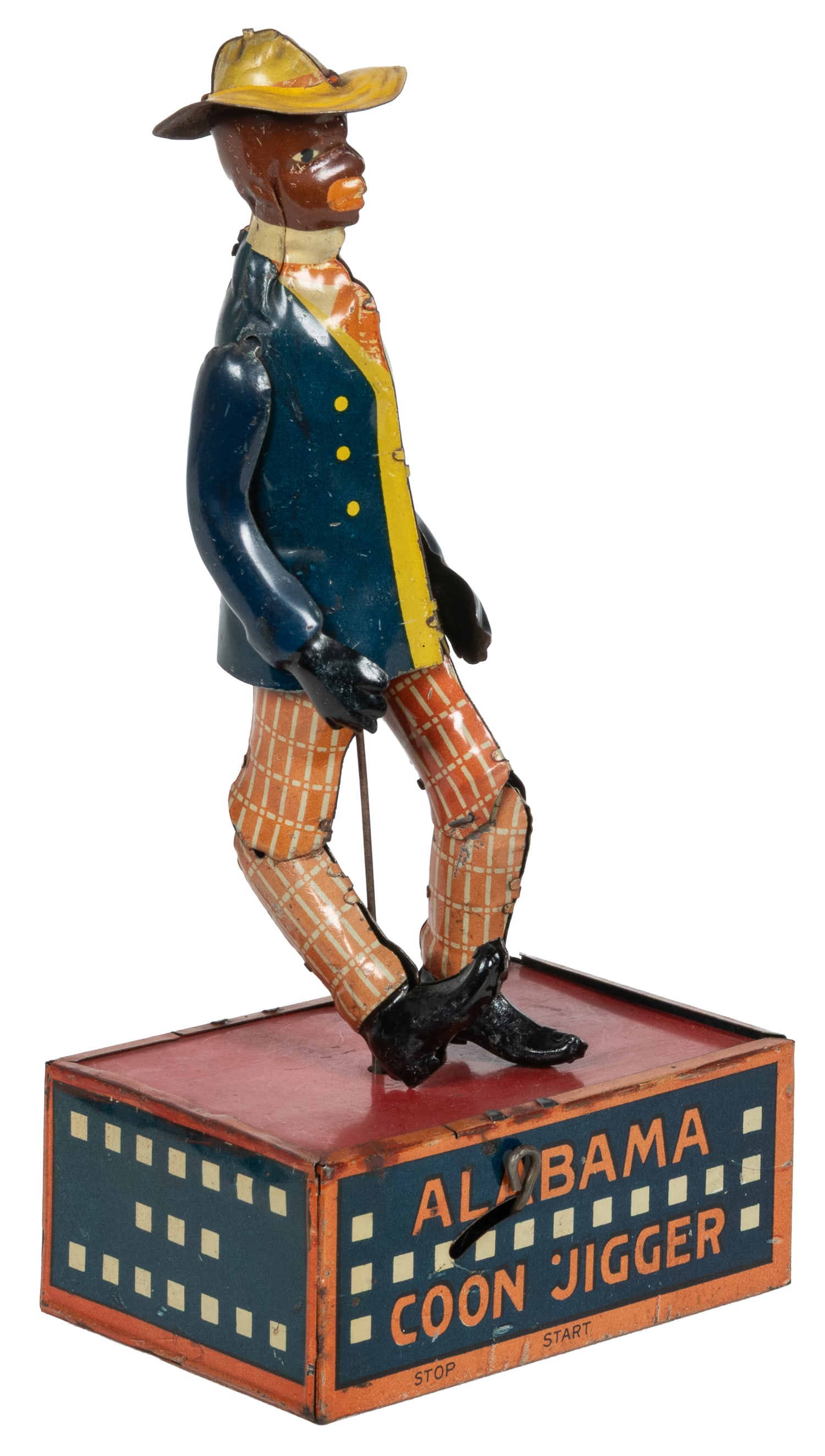 Ferdinand Strauss Alabama Coon Jigger tin wind-up toy.: Ferdinand Strauss Alabama Coon Jigger tin wind-up toy. New York, ca. 1910. Tin litho dancing figure on base.9 x 4 1/2 x 3 1/4".