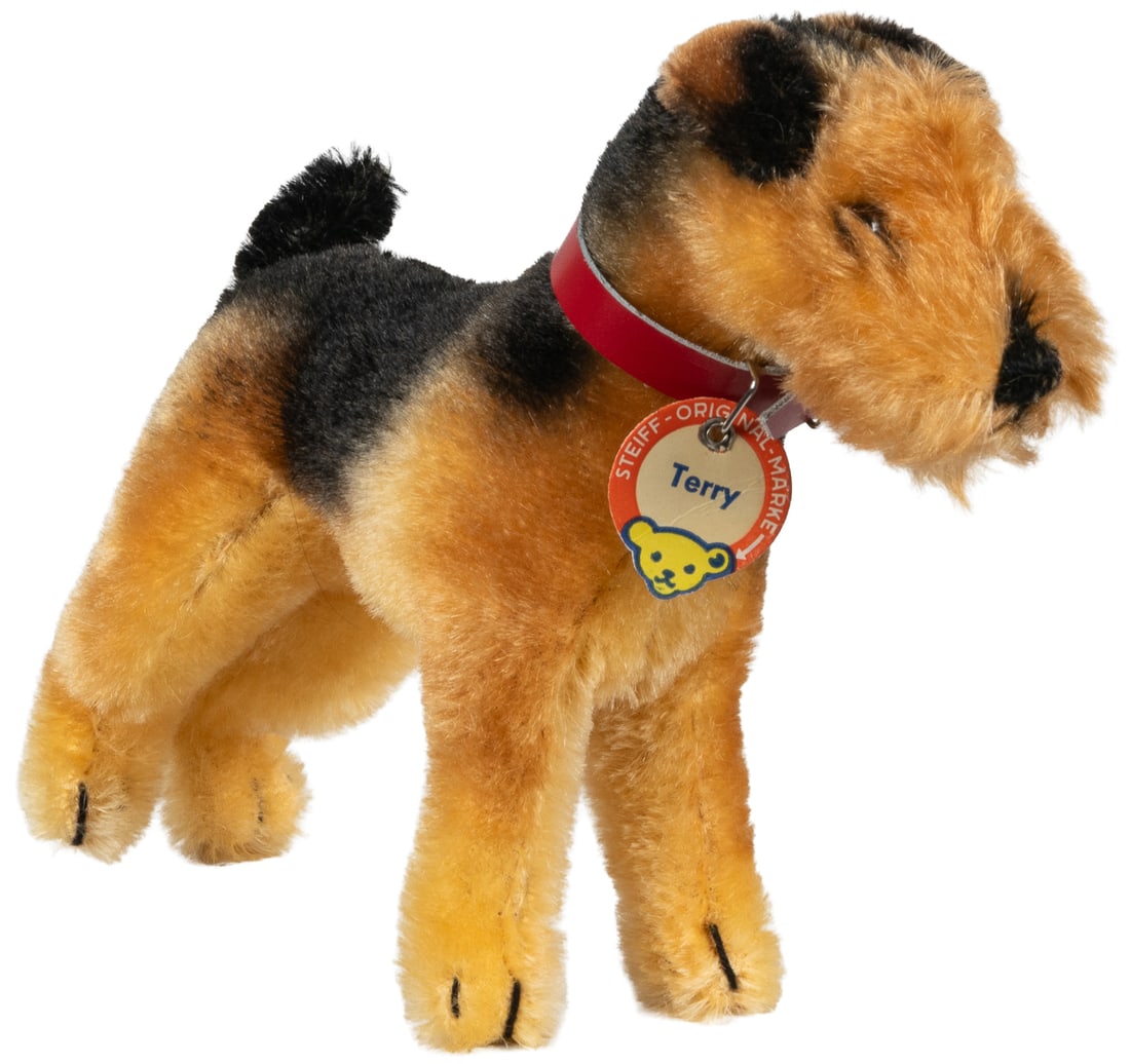 Steiff Terry vintage postwar terrier.: Steiff Terry vintage postwar terrier. Standing mohair terrier with paper collar tag and yellow ear tag (#1317.00).7 x 9 x 2 1/2".