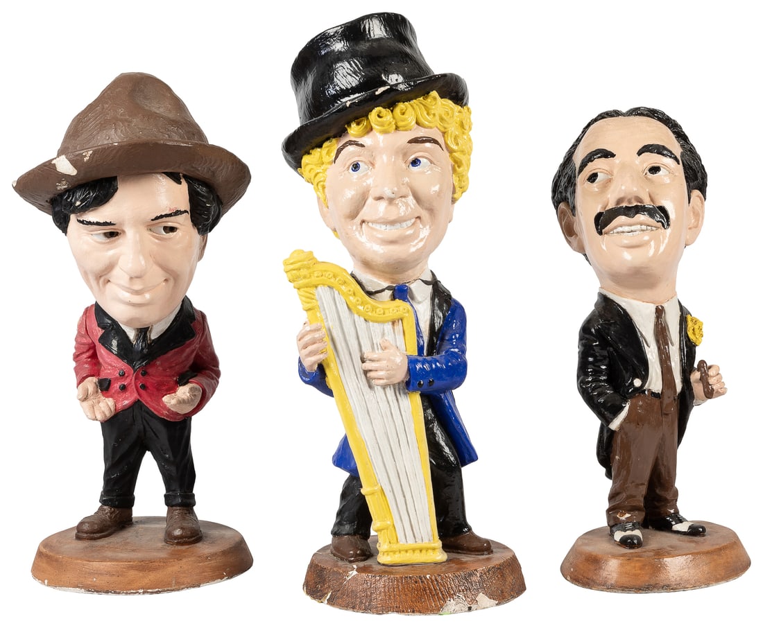 [MARX BROTHERS]. Group of items including chalkware figures and Seymour Chwast lithograph. (1 of 1)