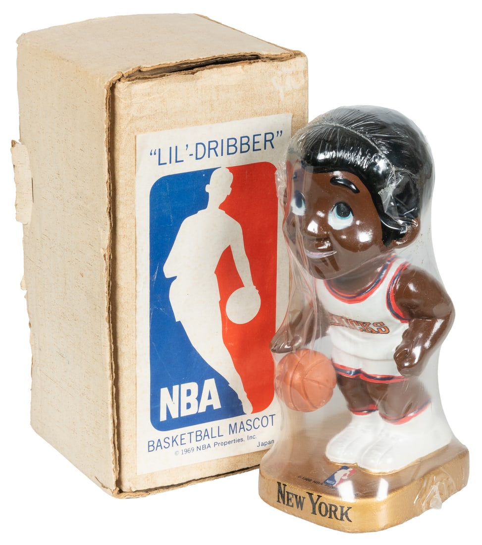 NBA Lil Dribber New York Knicks statuette.: NBA Lil Dribber New York Knicks statuette. 1969. Figure in shrinkwrap, with original box.7 x 3 x 3".