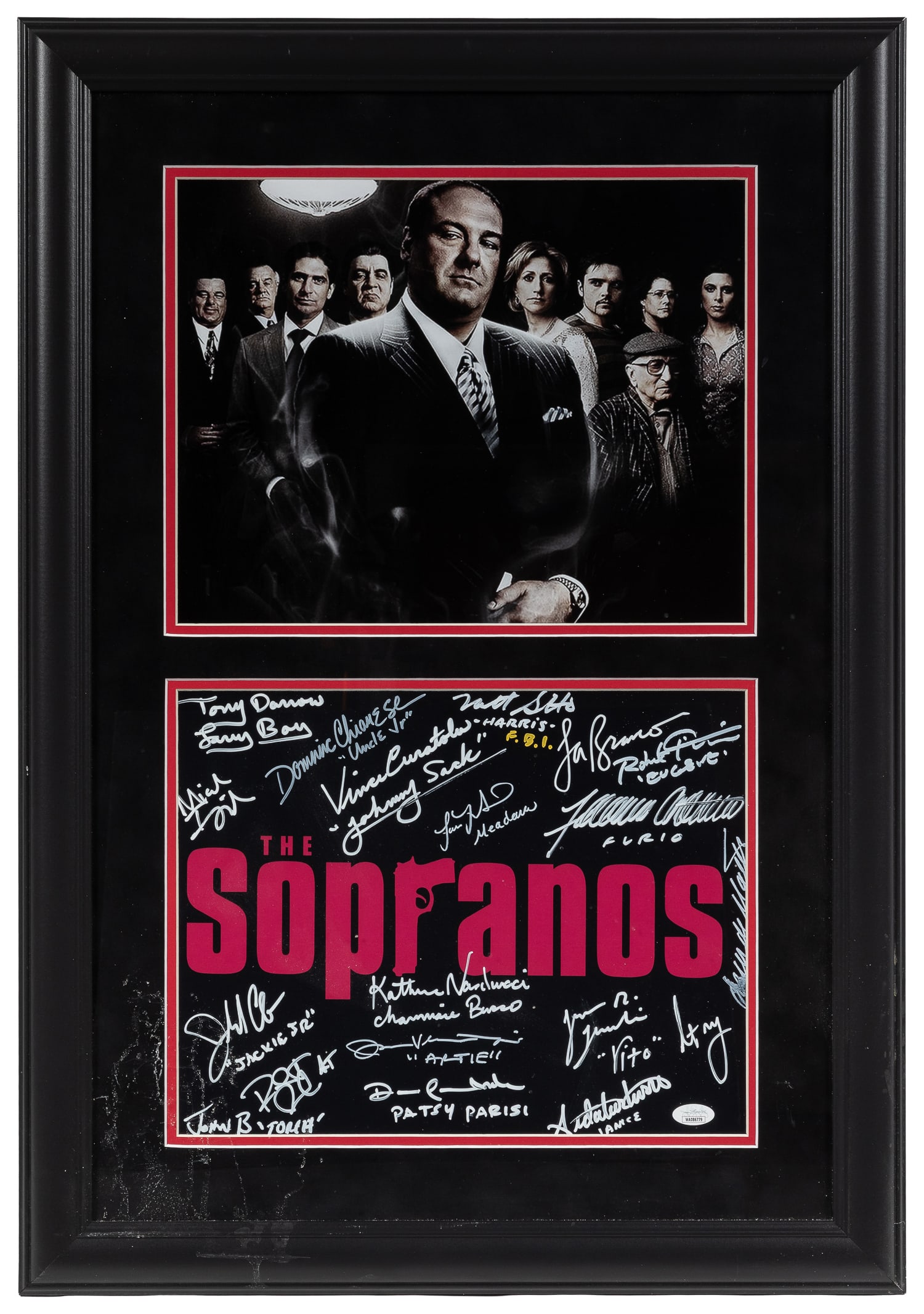 The Sopranos cast signed photograph (JSA).: The Sopranos cast signed photograph (JSA). Framed display including a cast-signed photograph of the show's title. Signers include Lorraine Bracco, Federico Castelluccio, Kathrine Narducci, Dan Grimald
