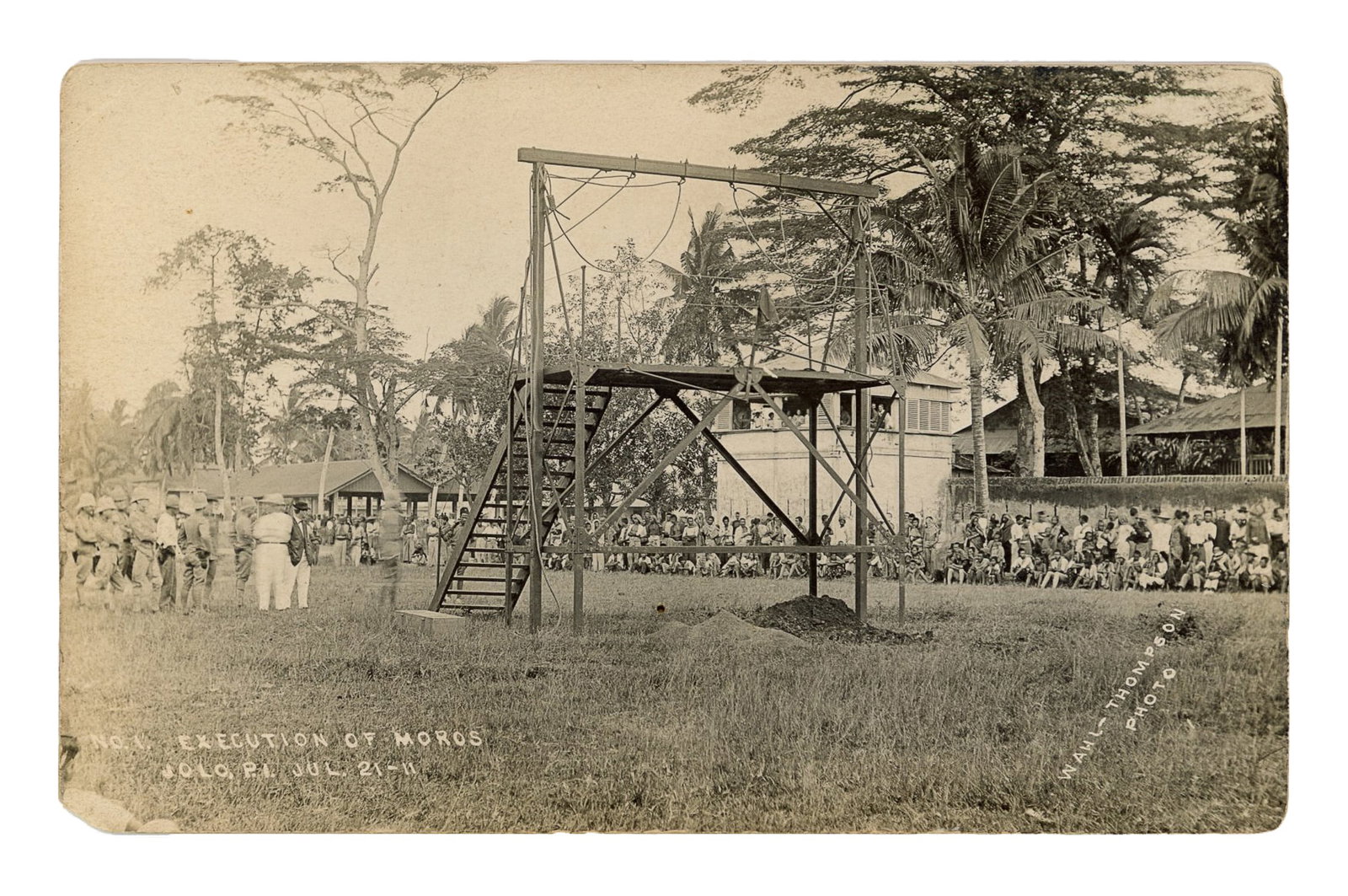 RPPC of Execution of Moros. Jolo, Sulu: July 21, 1911.: RPPC of Execution of Moros. Jolo, Sulu: July 21, 1911. Black and white with sepia toning. Divided back; postally unused. 5 1/4 x 3 1/4".