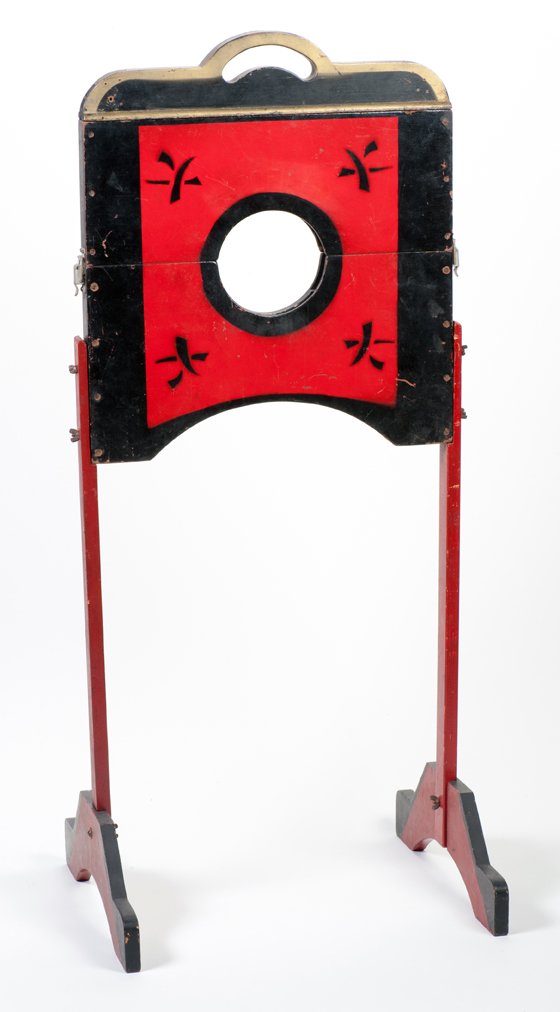 Guillotine Chopper. Colon, Abbott's Magic Co: Guillotine Chopper. Colon, Abbott's Magic Co., ca. 1950. Faux guillotine decorated in black, red and gold with an Asian motif. Blade cuts various items, but passes through a spectator’s neck without