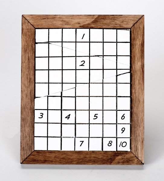 Winston Freer Tile Puzzle. Karl Norman, ca. 1986: Winston Freer Tile Puzzle. Buffalo, Karl Norman, ca. 1986. A grid of tiles is exhibited and shown to contain nine rows of seven tiles each. Three tiles are plainly removed, but when the grid is reasse