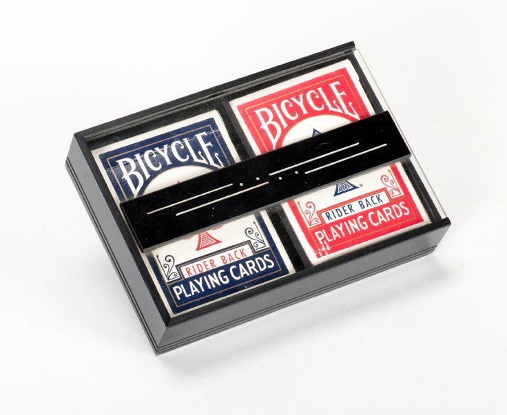 Surprise Box. Leiden Holland, Anverdi, ca. 1980: Surprise Box. Leiden Holland, Anverdi, ca. 1980. A card is selected and lost in the deck. The cards are dealt into a two-deck case one at a time, face down. Suddenly, the lid of the box snaps shut on