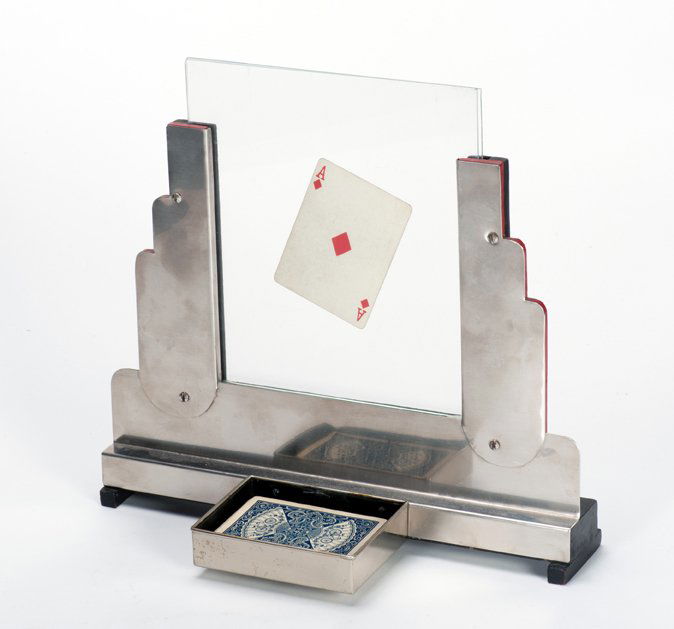 Television Card Frame. American, ca. 1949.: Television Card Frame. American, ca. 1949. A selected card appears between two panes of glass in a flash of fire. Handsome metal-covered frame includes box in front in which flash paper can be ignited