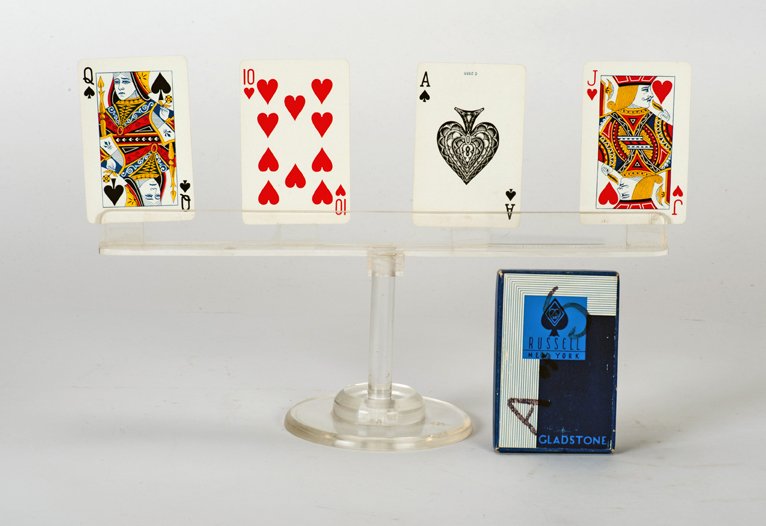 Ultissimo. Merv Taylor, ca. 1955: Ultissimo. North Hollywood, Merv Taylor, ca. 1955. Clear Lucite stand which allows the magician to perform a mental feat in which his two predictions match two cards selected by spectators. With origi