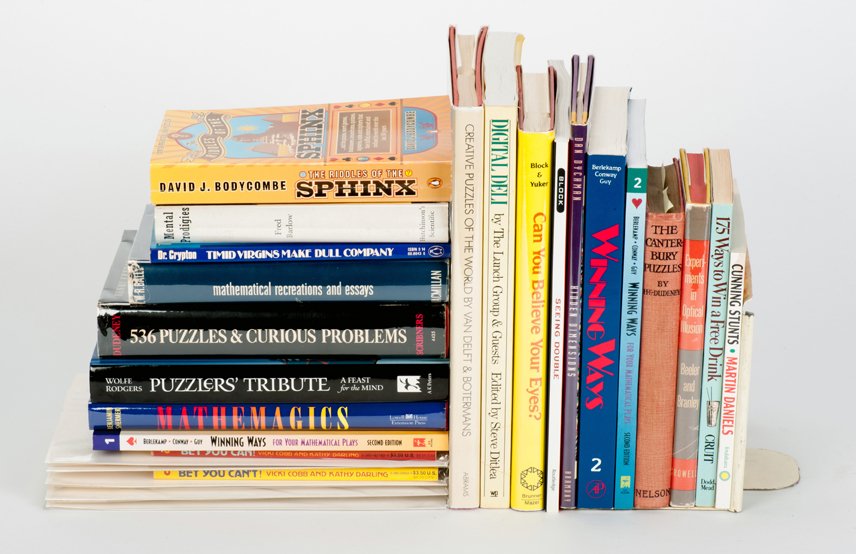 23 books of puzzles, riddles, math and mental tricks: [Puzzle Books] Group of 23 books of puzzles, riddles, math and mental tricks. Including Mental Prodigies (1952) by Fred Barlow; 536 Puzzles & Curious Problems (1967) by Henry Dudeney; Mathematical Rec
