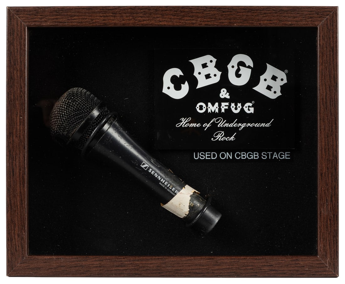 [CBGB & OMFUG CLUB]. Original Stage-Used Microphone, Framed in Shadowbox. [Circa 1973-2000s]. (1 of 1)