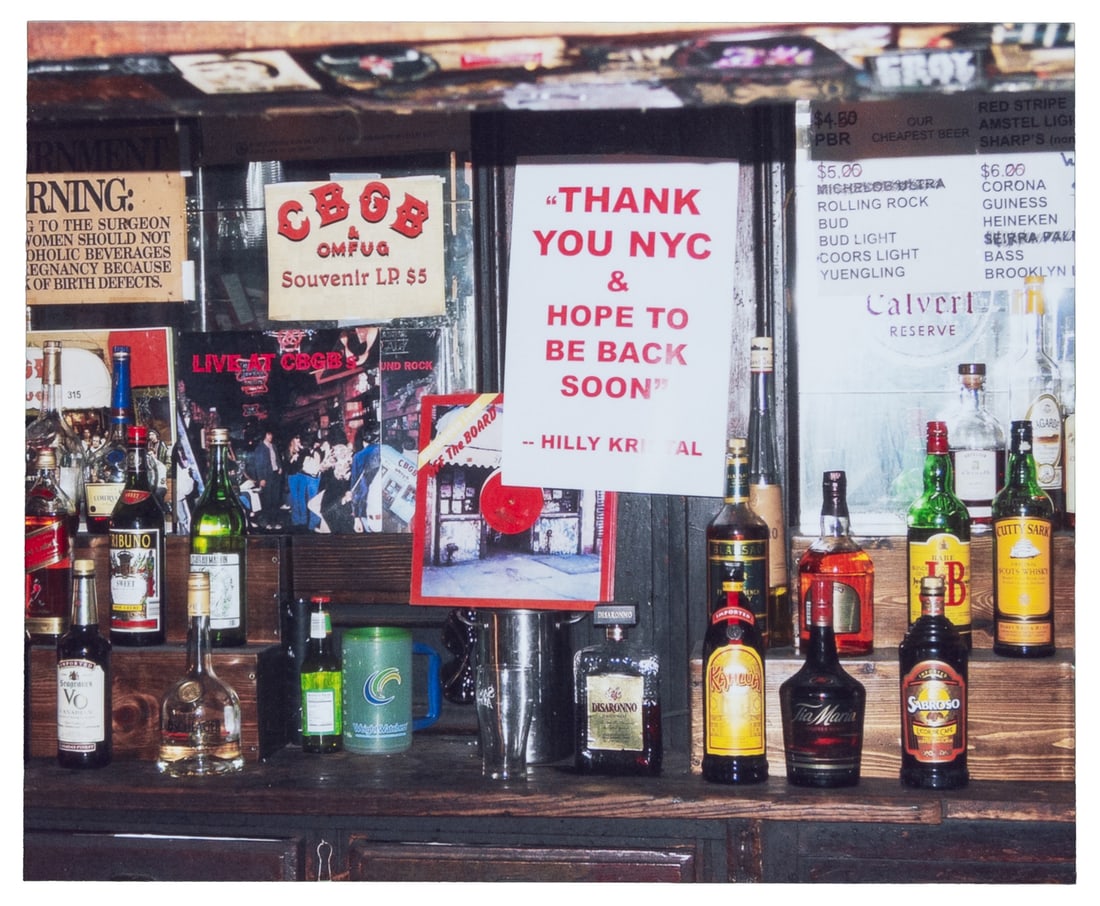 [CBGB & OMFUG CLUB]. "Thank You NYC..." Bar Sign that Hung in CBGB. [Circa 2000s].: [CBGB & OMFUG CLUB]. "Thank You NYC..." Bar Sign that Hung in CBGB. [Circa 2000s]. Glossy sign on white photo paper ("Staples" logo on verso), "'Thank You NYC & Hope to Be Back Soon' -- Hilly Kristal"