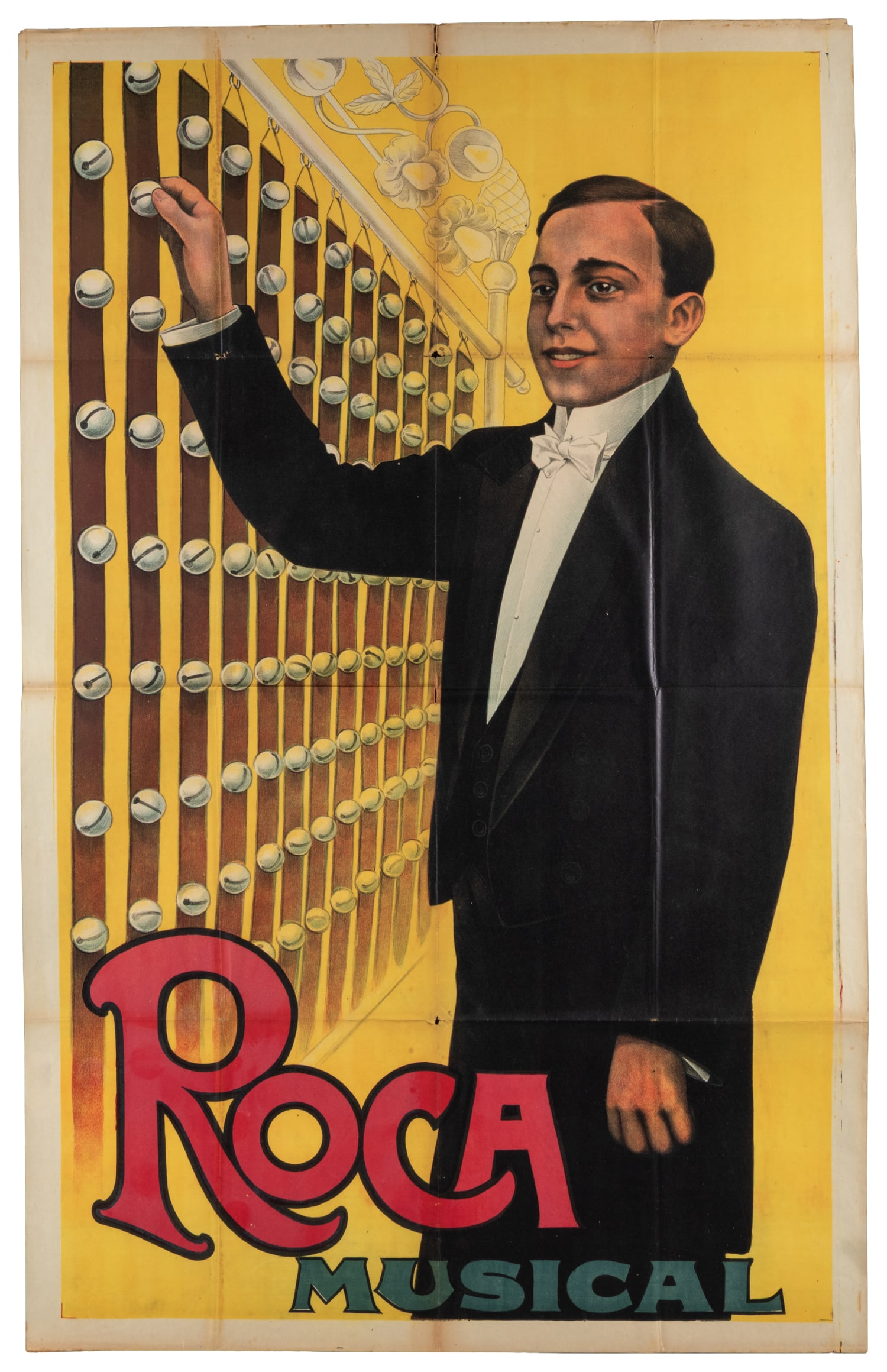Roca / Musical.: Roca / Musical. [Germany], ca. 1920s. Large color lithograph poster depicting the performer standing beside an ornate musical bells instrument. Paper. 57 x 36".
