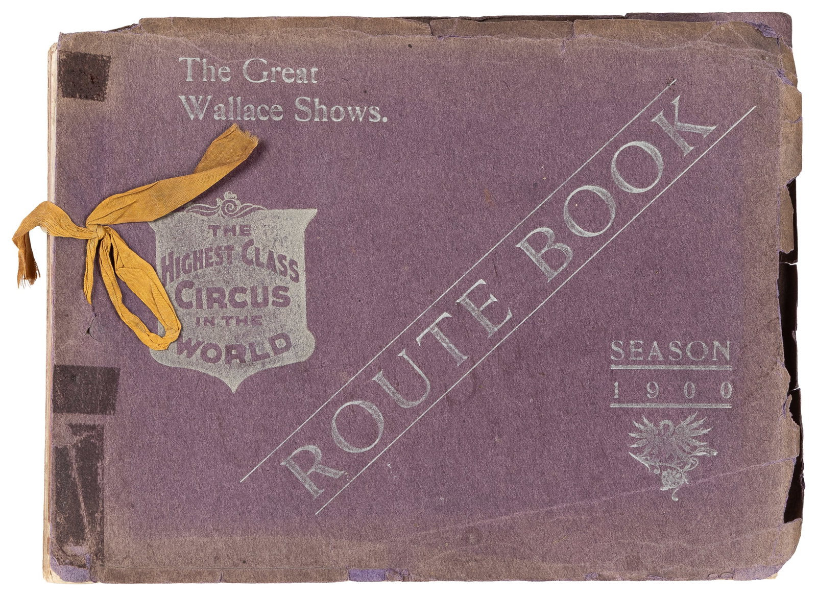 The Great Wallace Shows Route Book. Season 1900.: The Great Wallace Shows Route Book. Season 1900. Np, (1900). Original light purple wrappers (chipping to yapp-style edges). Numerous halftone illustrations of show managers, agents, and performers.