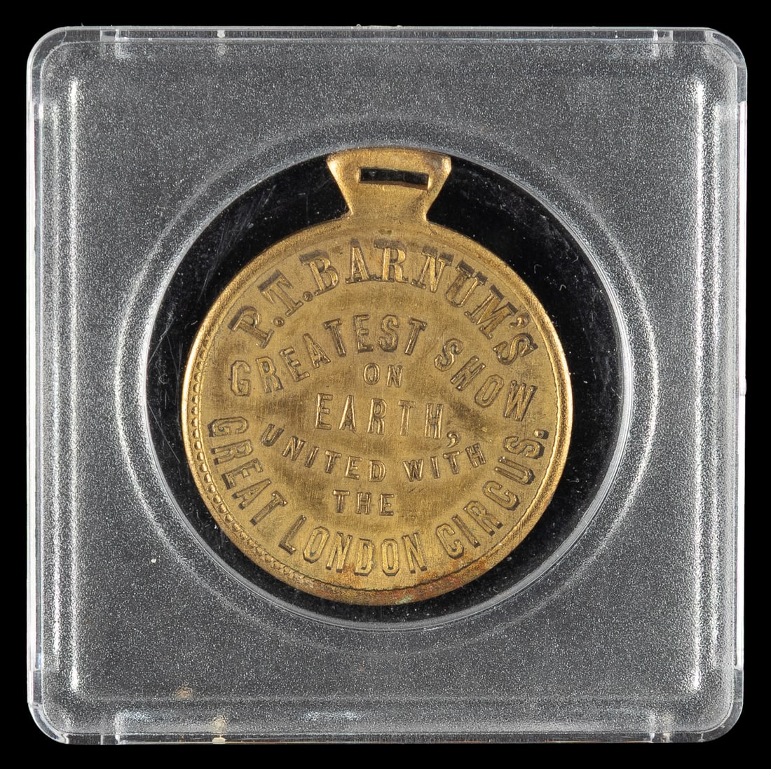 [STRATTON, Charles S. (Tom Thumb)]. Watch Fob / Charm Souvenir of Gen. and Mrs. Tom Thumb. 1881.: [STRATTON, Charles S. (Tom Thumb)]. Watch Fob / Charm Souvenir of Gen. and Mrs. Tom Thumb. 1881. Obverse depicts the couple in portrait. Reverse advertises "P.T. Barnum’s Greatest Show on Earth