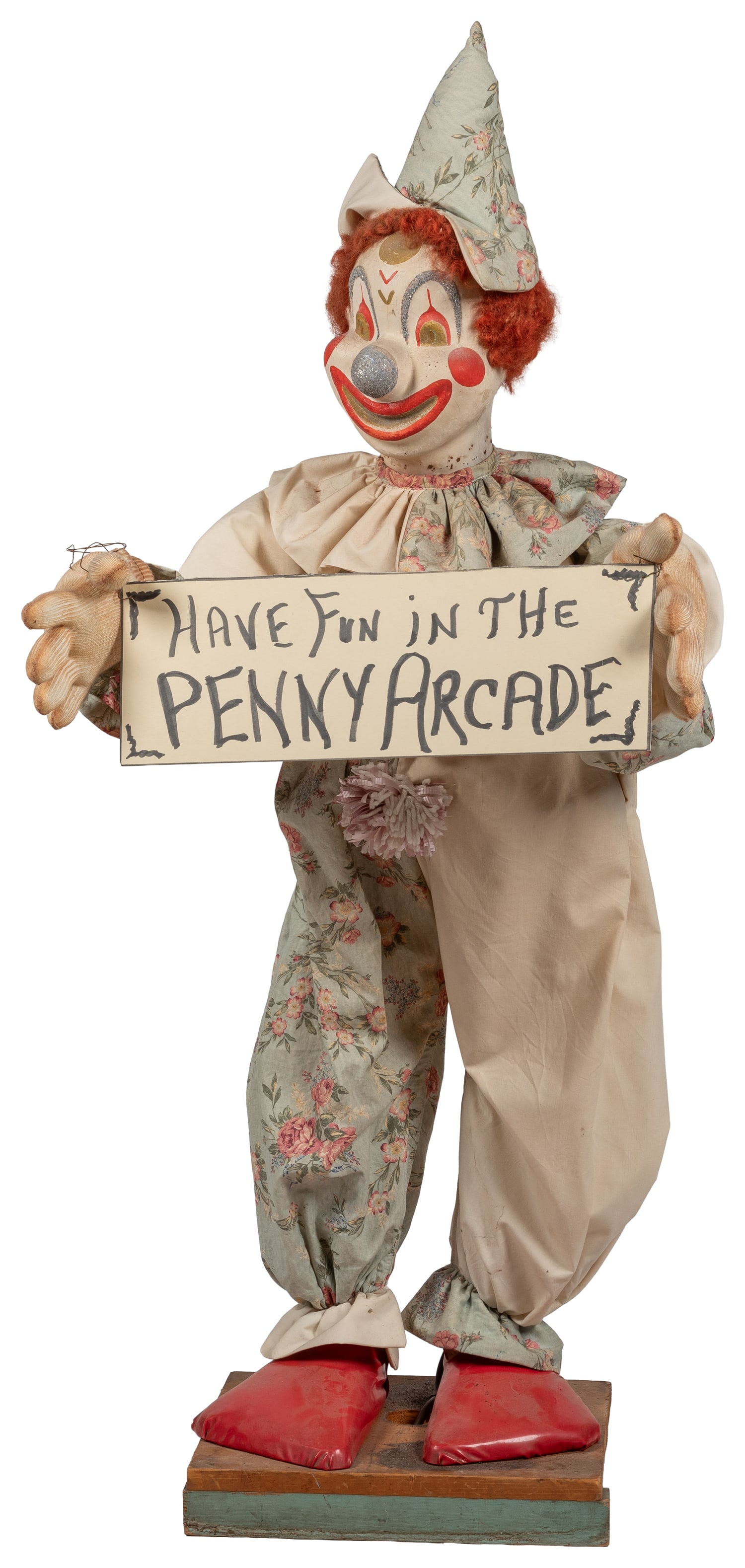 Penny Arcade animated clown figure.: Penny Arcade animated clown figure. Circa mid-20th century. Electric display figure with painted plaster-composition head, fabric clothing, and vinyl shoes, holding a hand-lettered cardstock sign; he 