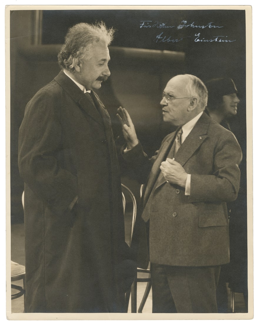 EINSTEIN, Albert (1879-1955). Large Photograph Inscribed by Einstein. [Universal City, CA, ca.: EINSTEIN, Albert (1879-1955). Large Photograph Inscribed by Einstein. [Universal City, CA, ca. 1920s-1930s]. Black and white photograph of Einstein speaking to John LeRoy Johnston (1897-1946), publici