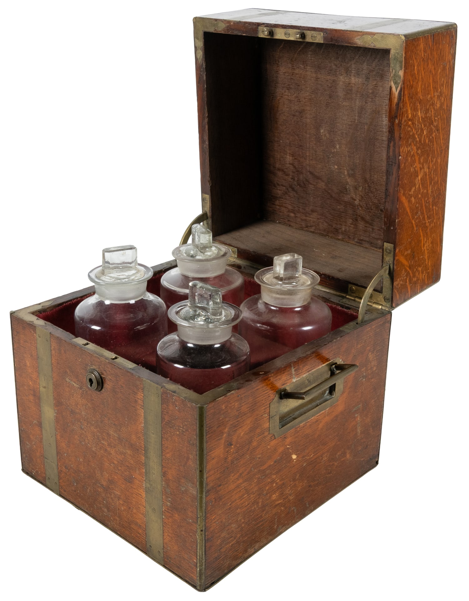 [APOTHECARY]. Portable Case for Four Glass Apothecary Jars. London: Hopkins, [ca. 19th century].: [APOTHECARY]. Portable Case for Four Glass Apothecary Jars. London: Hopkins, [ca. 19th century]. Handsome wooden case with brass accents, hinged lid, and velvet-lined base. Four intact glass