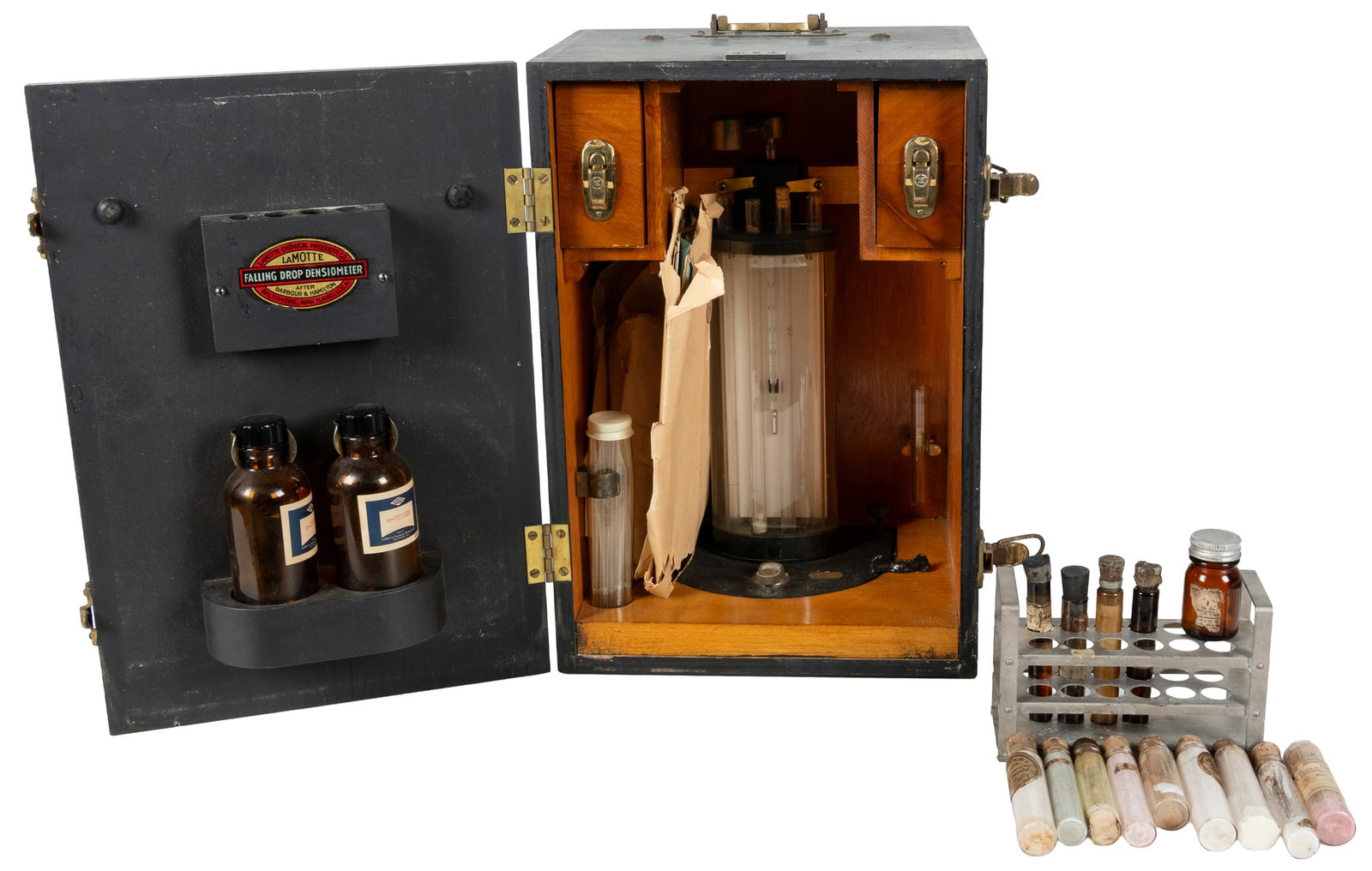 LaMotte Falling Drop Densiometer (Special Field Model) and Additional Medical Accoutrements. Circa: LaMotte Falling Drop Densiometer (Special Field Model) and Additional Medical Accoutrements. Circa 1940s. This device was designed "for determining blood proteins and specific gravity of body fluids. 