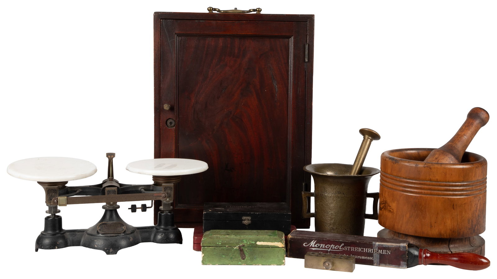 [APOTHECARY]. Assorted Group of Antique Apothecary / Pharmacy Items. [V.p., ca. 19th century].: [APOTHECARY]. Assorted Group of Antique Apothecary / Pharmacy Items. [V.p., ca. 19th century]. Including: Ohaus scale, five weights (out of eight) in wooden storage box, brass pessary suppository moul