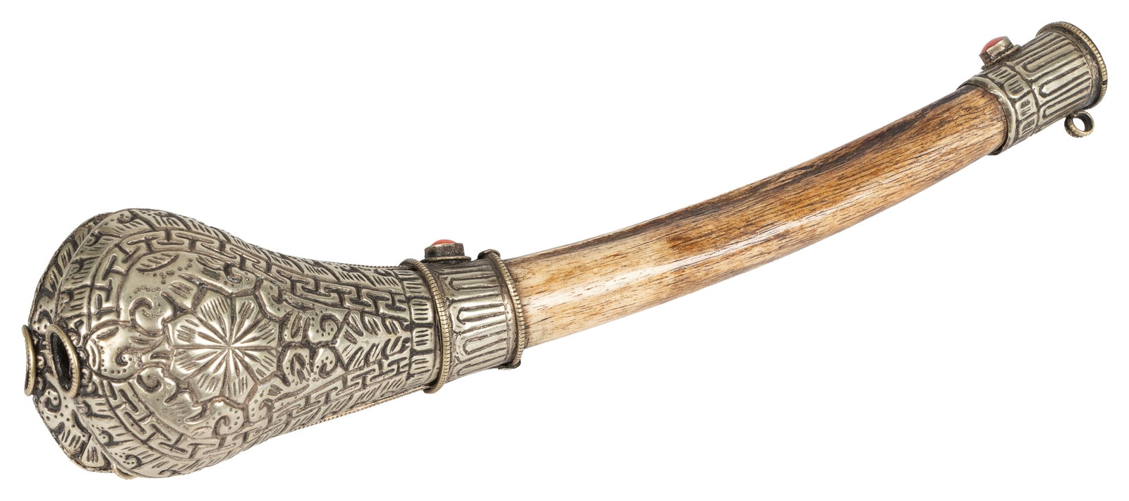Tibetan Kangling Human Leg Bone Trumpet. Circa 19th century.: Tibetan Kangling Human Leg Bone Trumpet. Circa 19th century. With decorative metal fittings and coral cabochons. This sacred ritual instrument is traditionally crafted from a human femur or tibia and