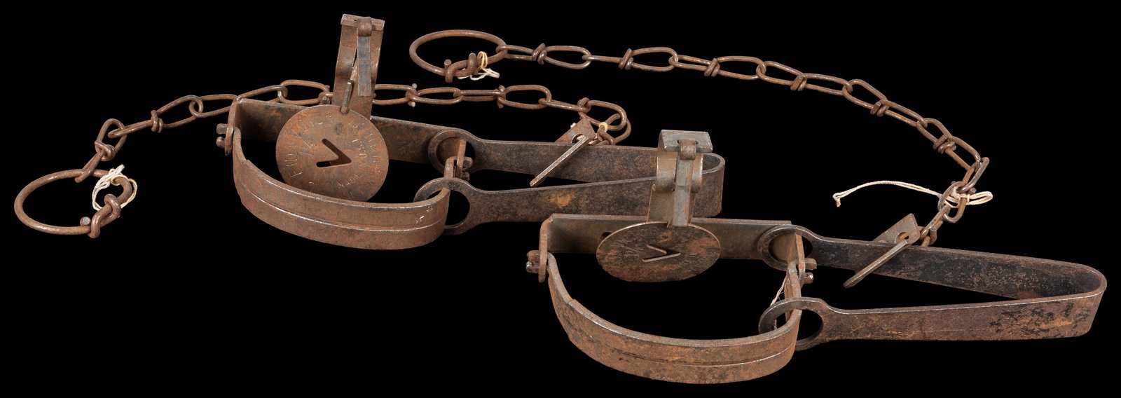 Pair of Oneida Victor #1 1/2 Traps. Lititz, PA: Animal Trap Co., ca. 1930s-1950s. (1 of 3)